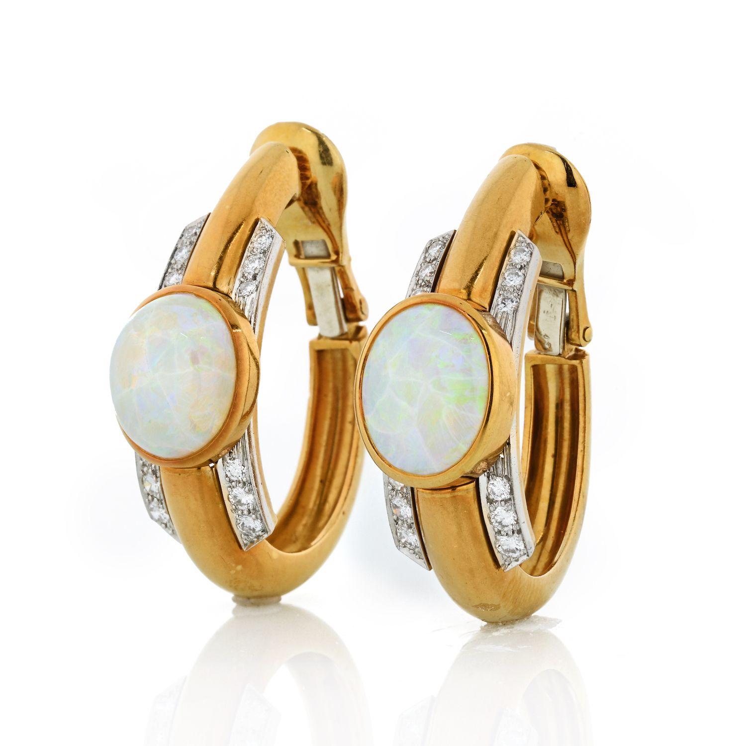 A true embodiment of the imaginative and visionary aesthetic of the brand, this David Webb statement piece stuns with bold shapes and exuberant color. This item features stunning opal cabochons and scintilating brilliant-cut diamonds. Clip-on