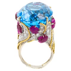 David Webb Oval Aquamarine, Carved Ruby, and Diamond Cocktail Ring