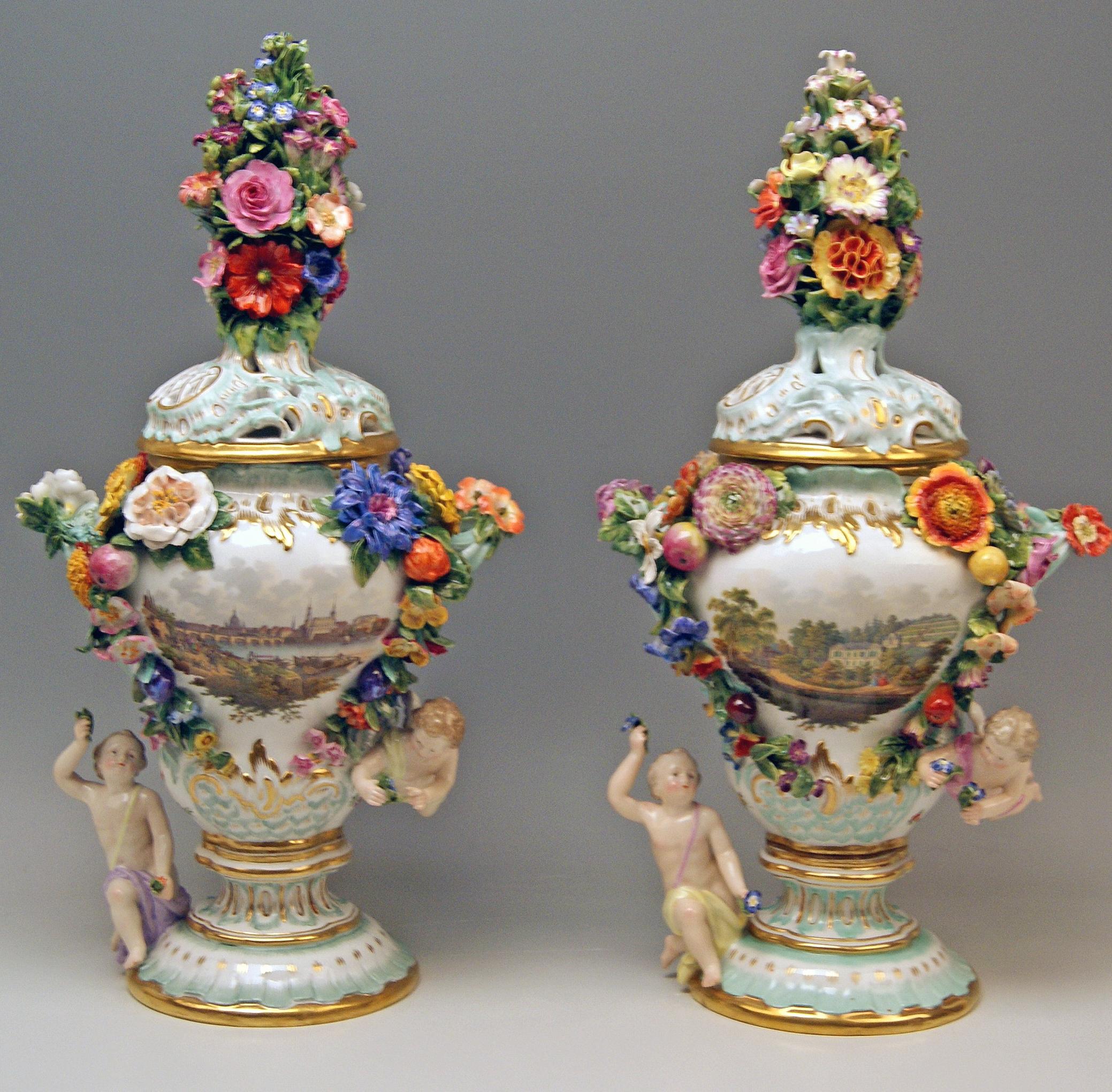 Meissen gorgeous quite rare items:
A Pair of Potpourri Lidded Vases with abundantly sculptured decorations as well as with stunning topographical pictures and nicest flower paintings.

Manufactory: Meissen
Hallmarked:  Blue Meissen Sword Mark 