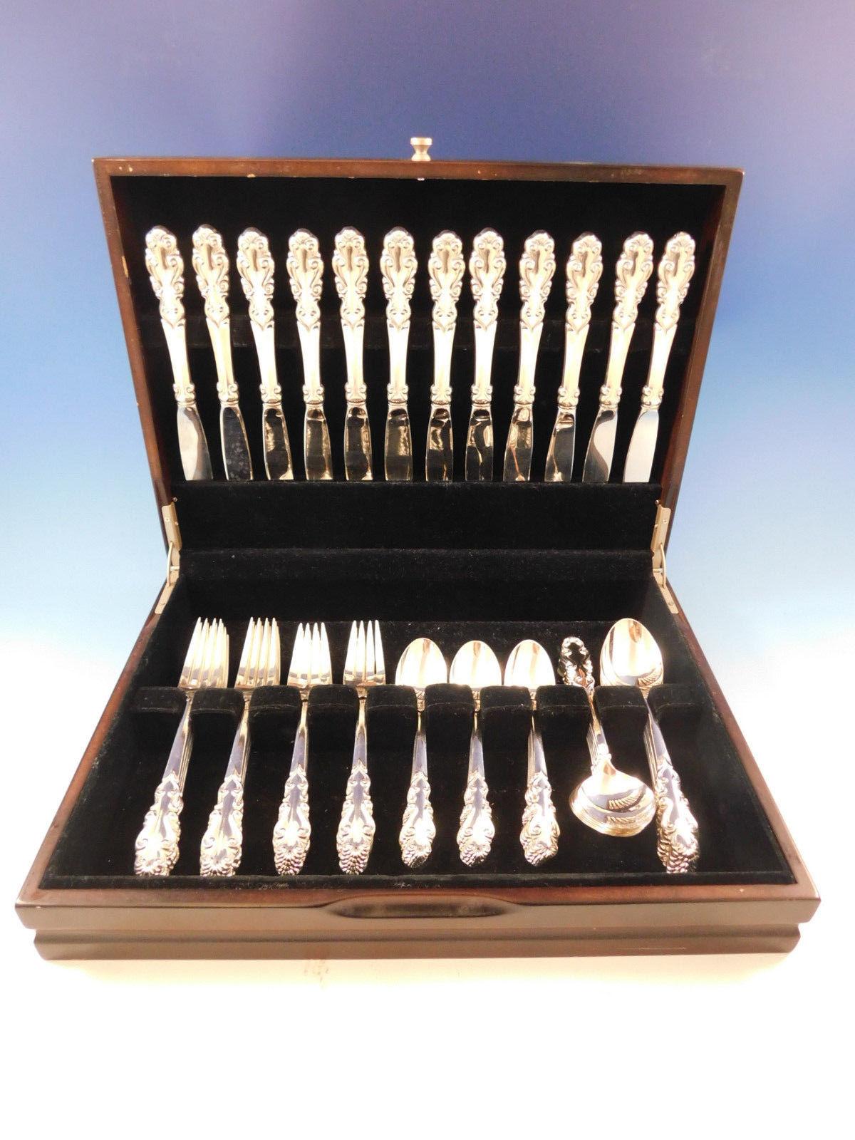 Esplanade by Towle sterling silver flatware set of 60 pieces. This set includes:

12 knives, 8 7/8
