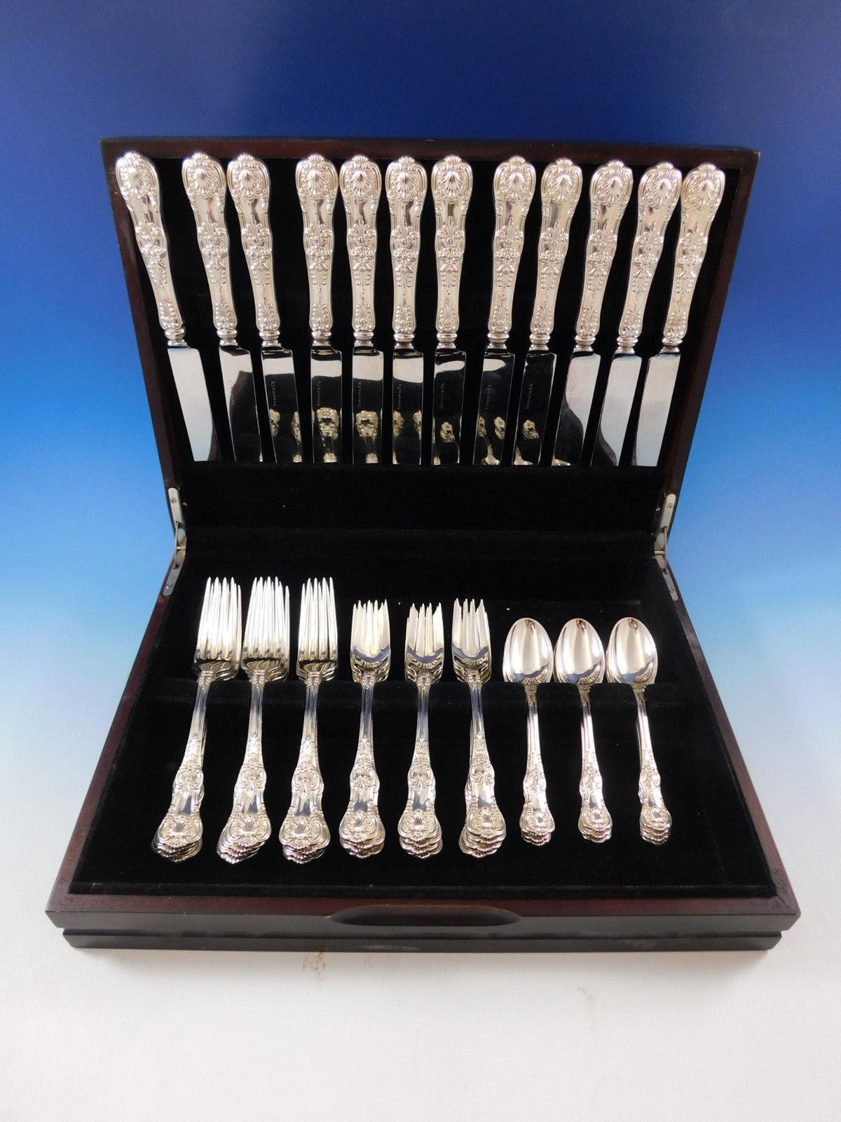 Superb dinner size English king by Tiffany & Co. sterling silver flatware set, 48 pieces. This set includes:

12 dinner size knives, 10 1/8