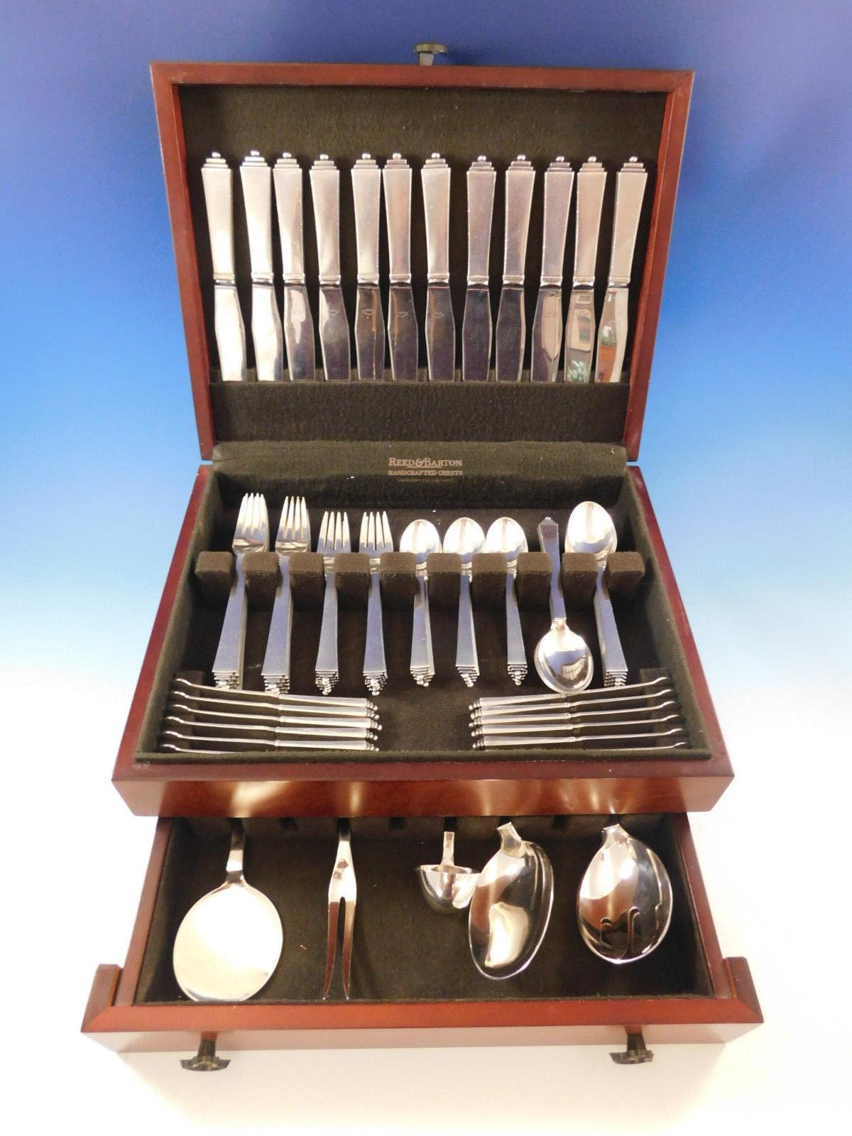 Superb dinner size pyramid by Georg Jensen sterling silver flatware set, 78 pieces. This set includes:

12 dinner knives, short handle, 8 7/8