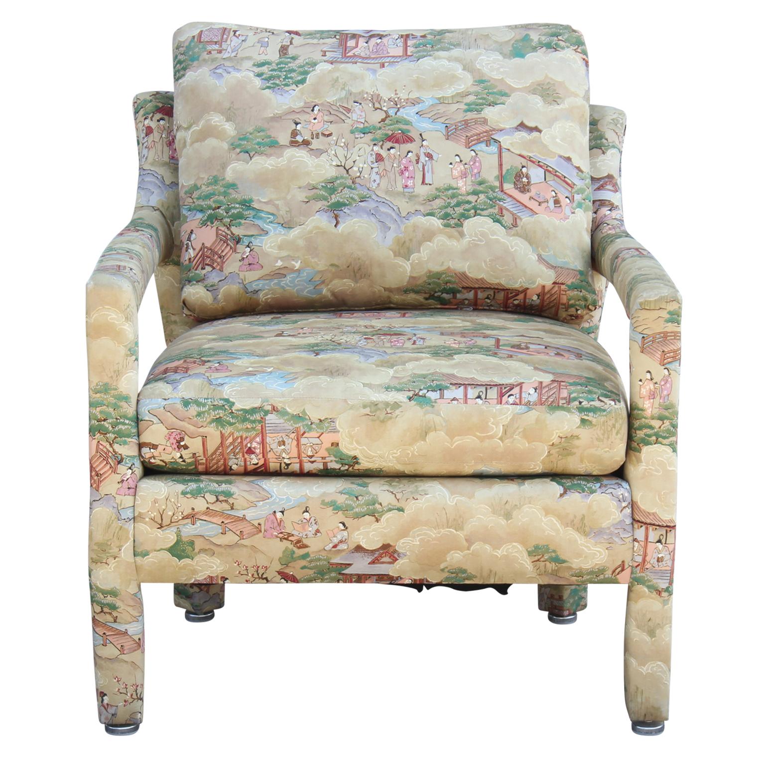 A set of beautiful Parsons styled barrel back lounge chairs with whimsical chinoiserie landscape fabric. The delightful scenery and soft pastel colors make these chairs a great statement piece in any room.