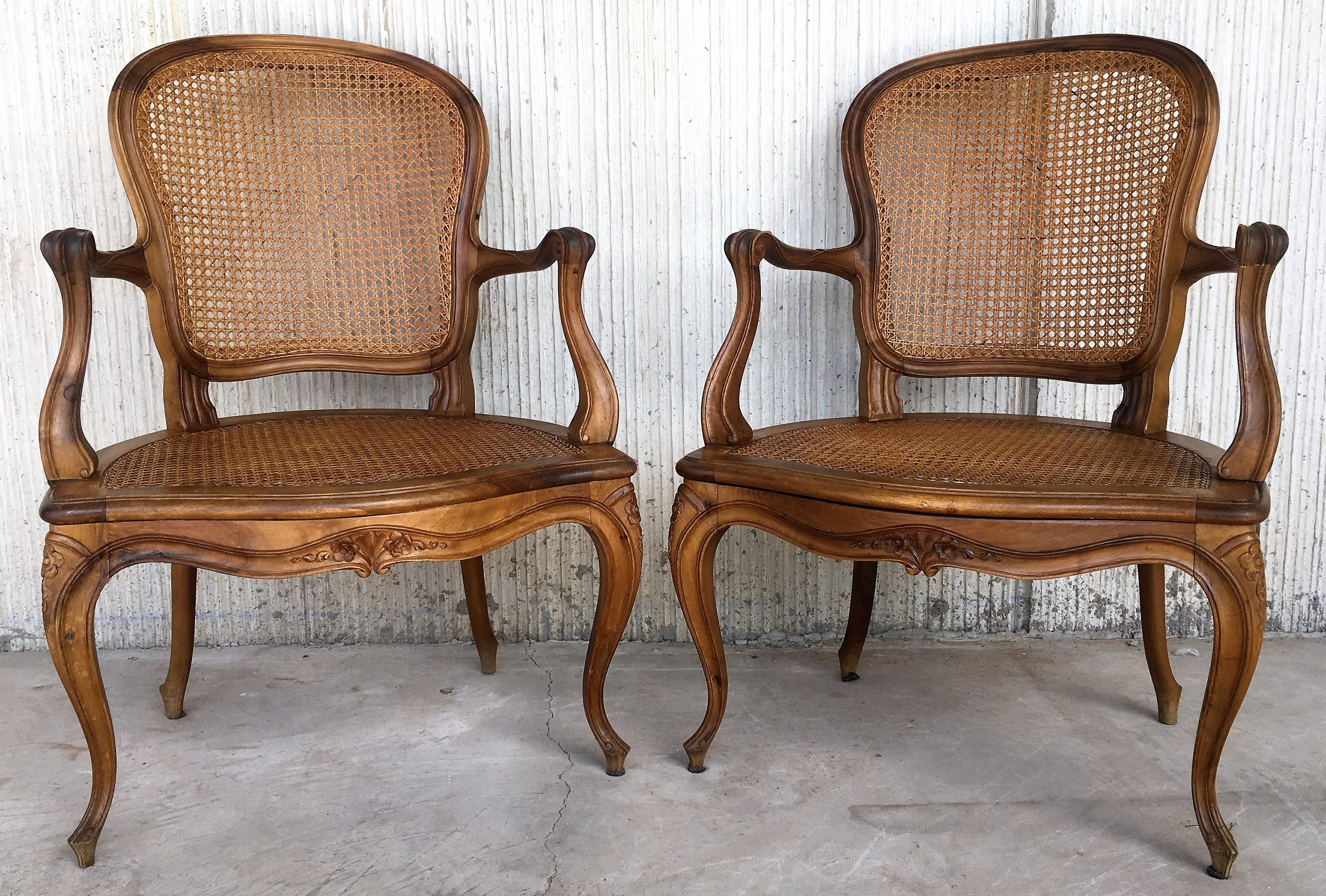 Louis XV carved Provincial Fauteil's with caned seats and backrests with velvet upholstered rigid cushions-seats, carved crests, rails, arms, and legs.
Really beautiful and perfect shape.