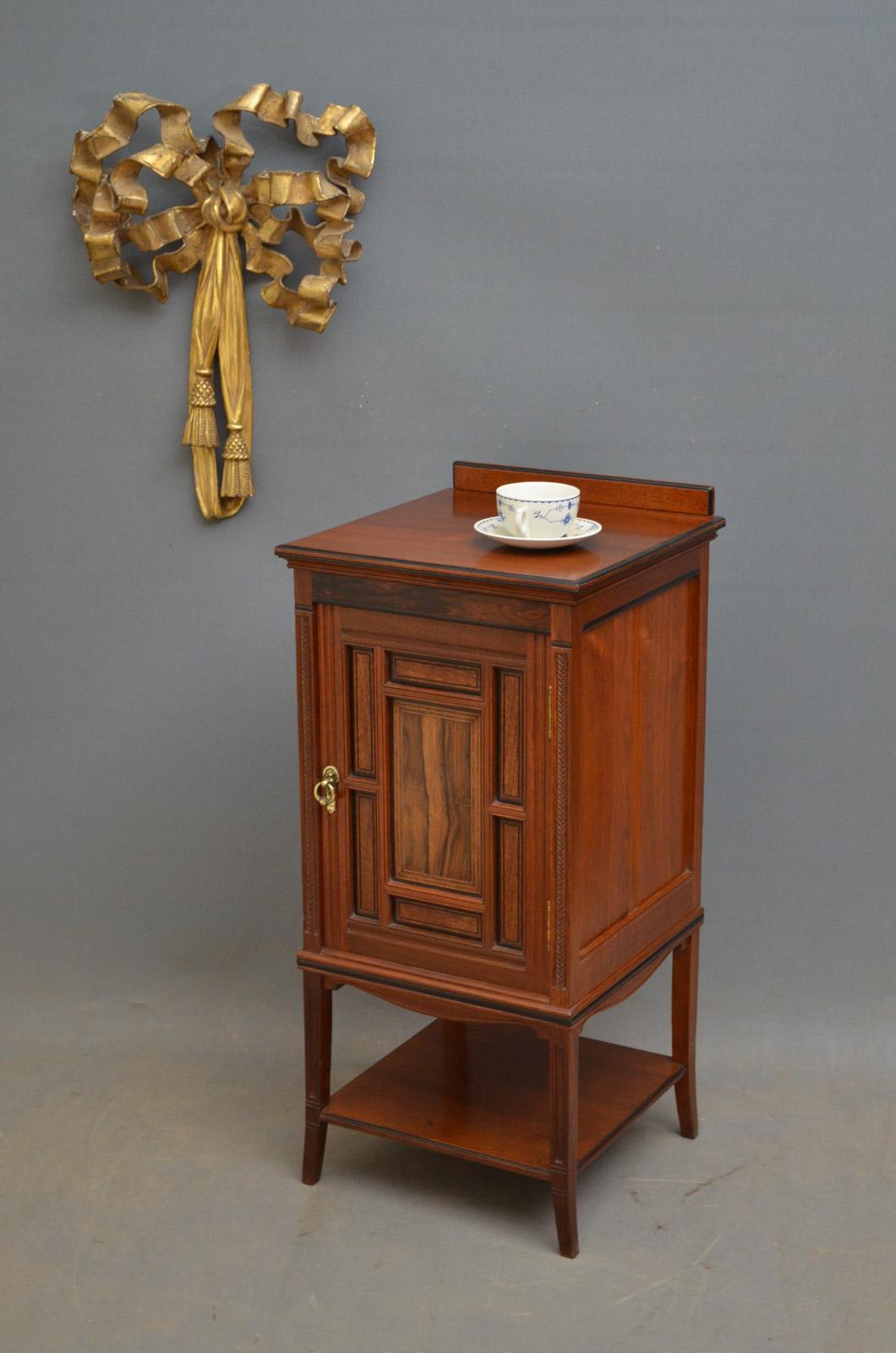 Sn4052, an exhibition quality Victorian - Aesthetic Movement bedside cabinet, having figured top above panelled door, panels being inlaid with Coromandel, satinwood and ebonized, all standing on chevron carved outswept legs united by undertier all