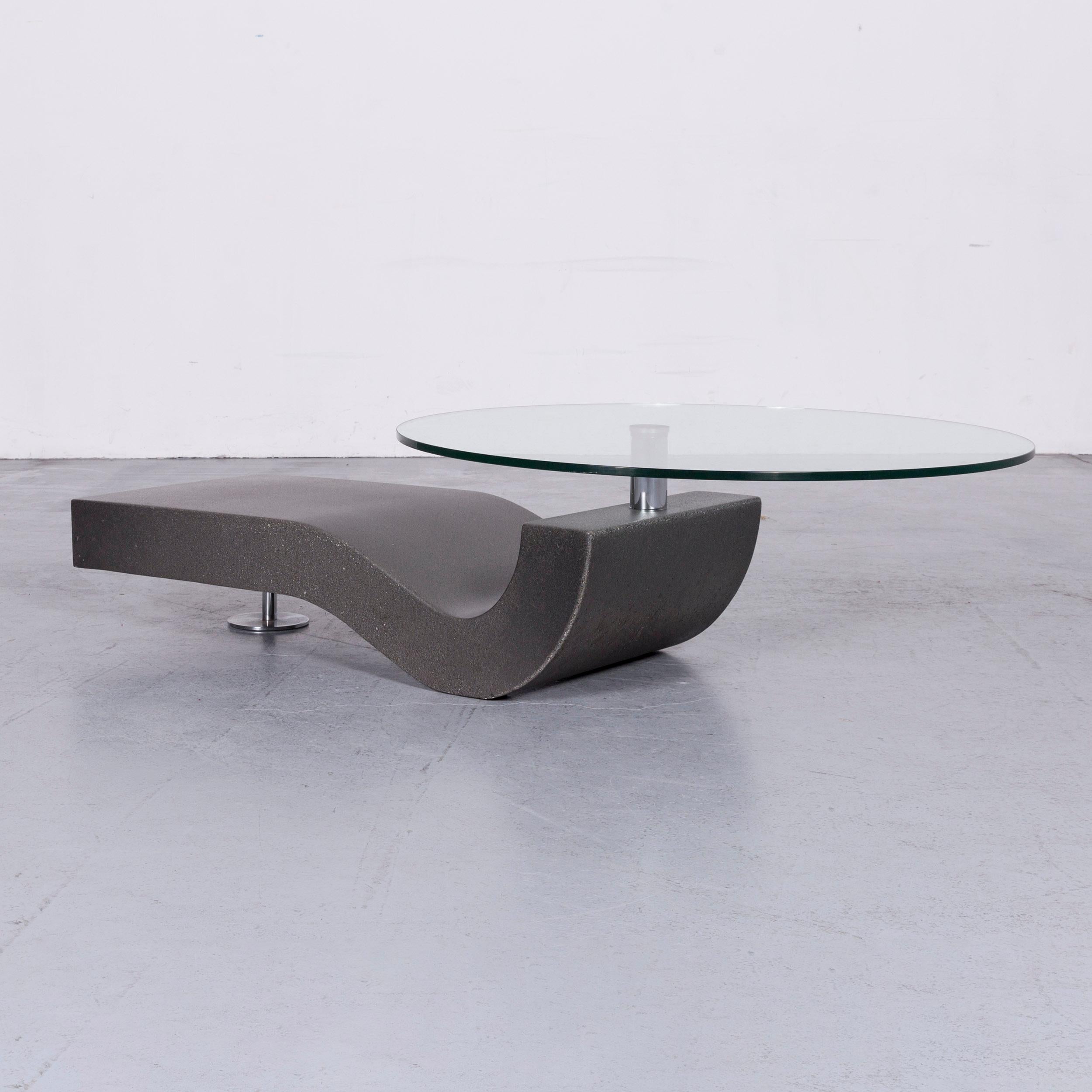 We bring to you a Ronald Schmitt designer glass coffee table grey.










 