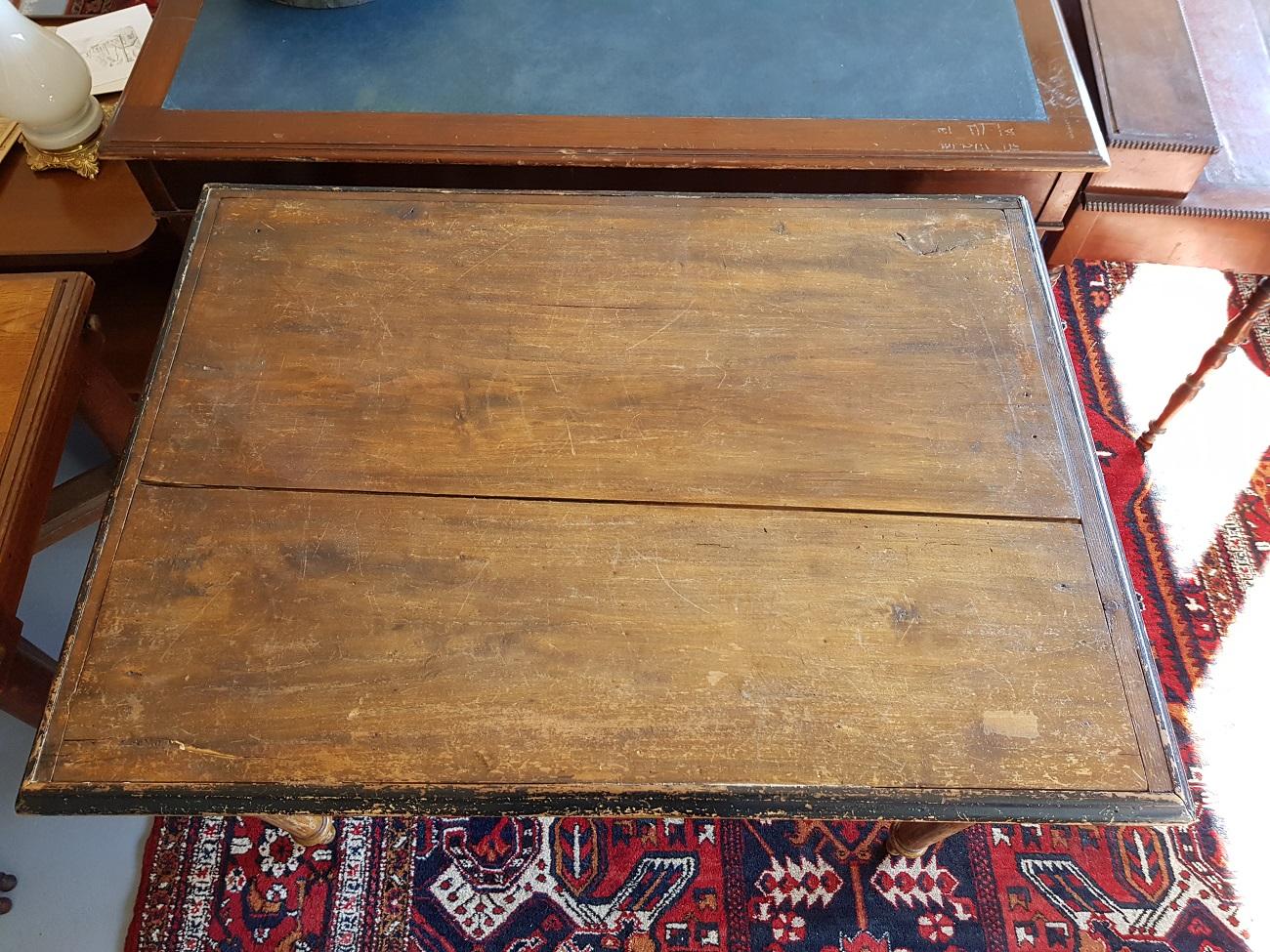 Lovely and distressed Old French farmers pine wood kitchen table with drawer and carved legs, late 19th century.

The measurements are,
Depth 80 cm/ 31.4 inch.
Width 111 cm/ 43.7 inch.
Height 75 cm/ 29.5 inch.
      