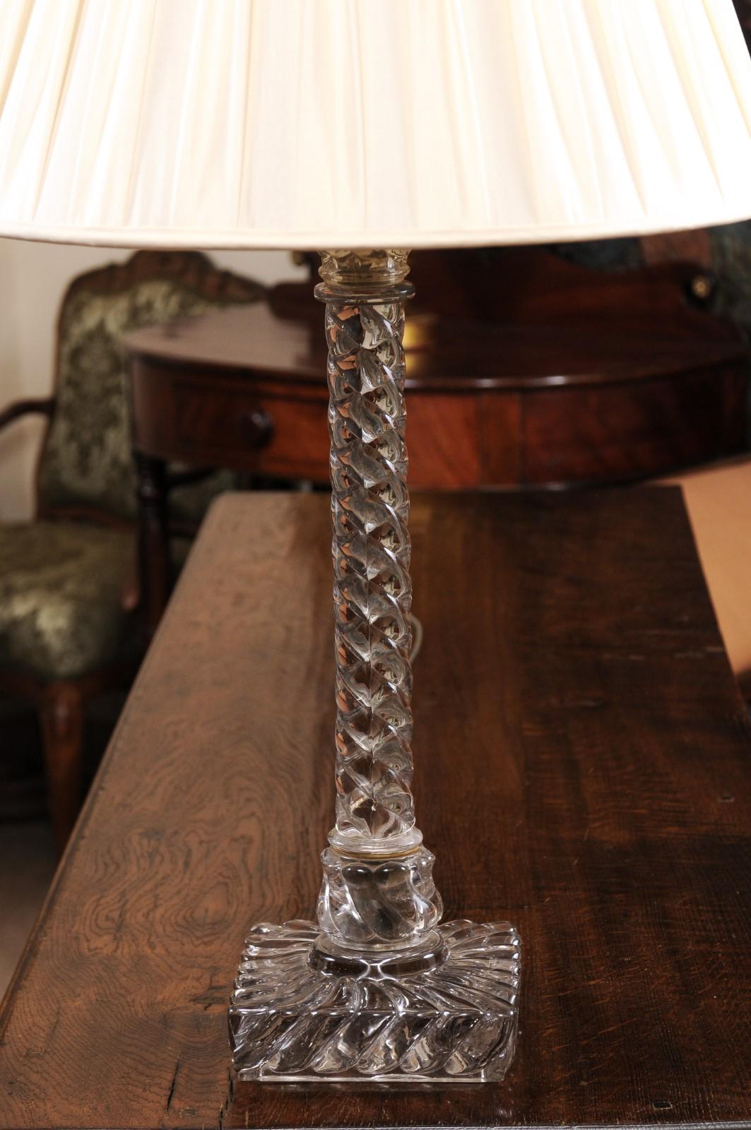 The large French Baccarat crystal lamp featuring twisted column and square base. The finial and shade included. 

 