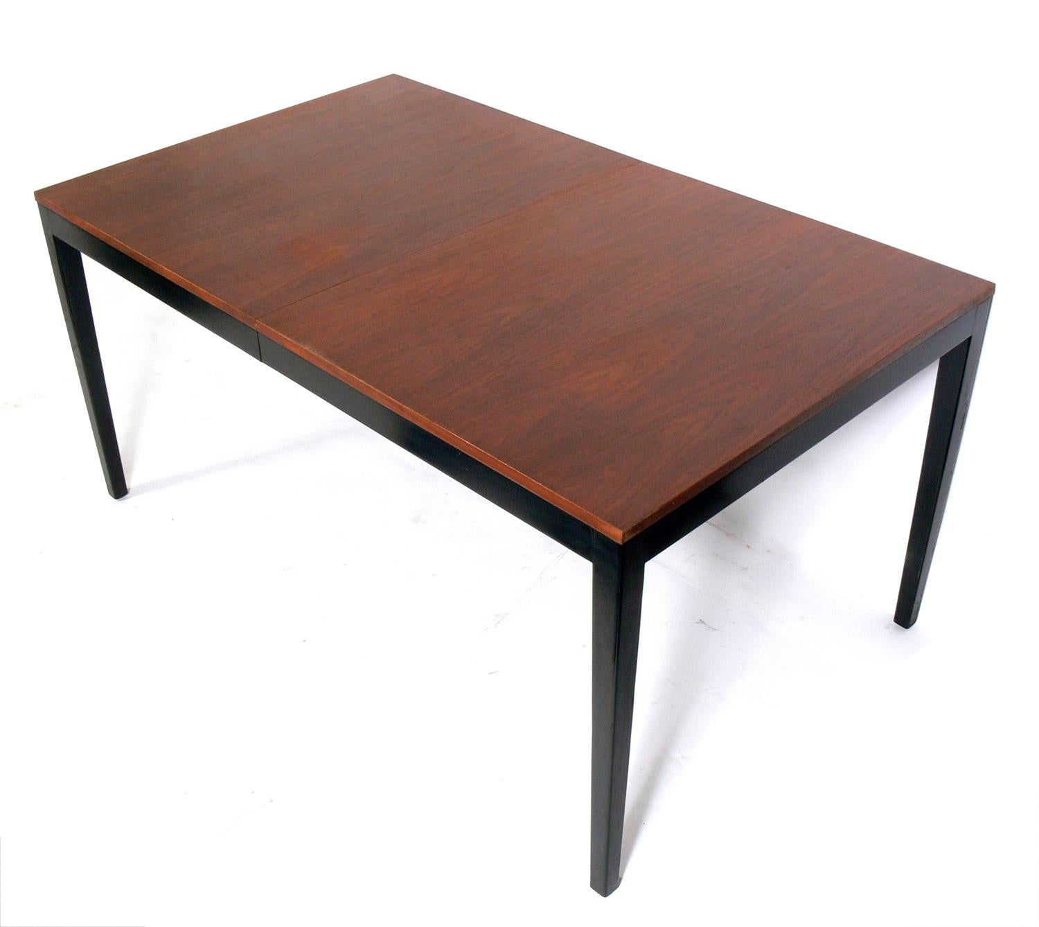 Clean lined midcentury dining table, designed by George Nelson for Herman Miller, American, circa 1960s. This piece is currently being refinished and will look incredible when it is completed. The price noted below includes refinishing. The table
