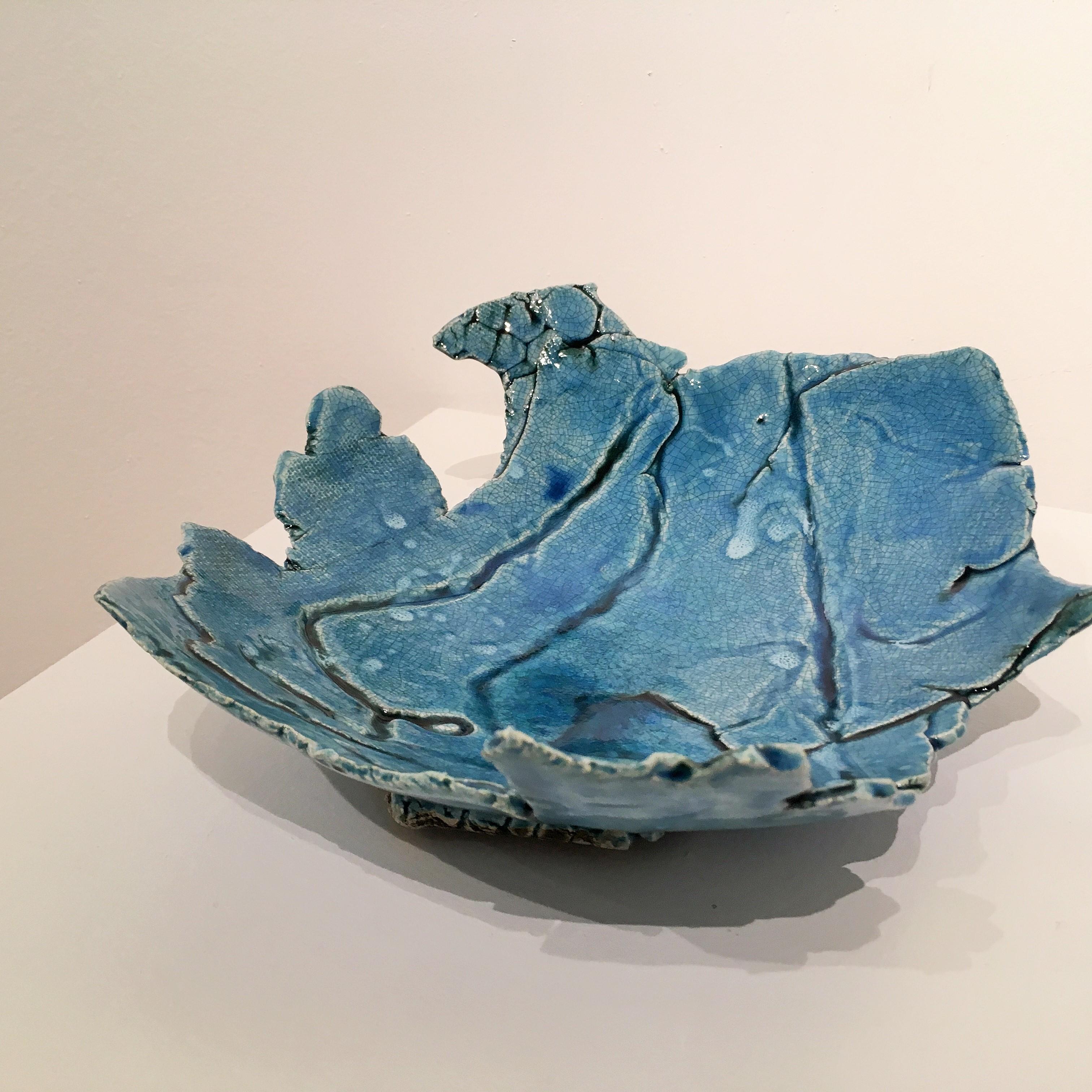 Contemporary ceramic bowl by Stacey H. Hammond. Bowl is sea foam in color, composed of overlapping ceramic elements. It is oval shape, with height of 3.00