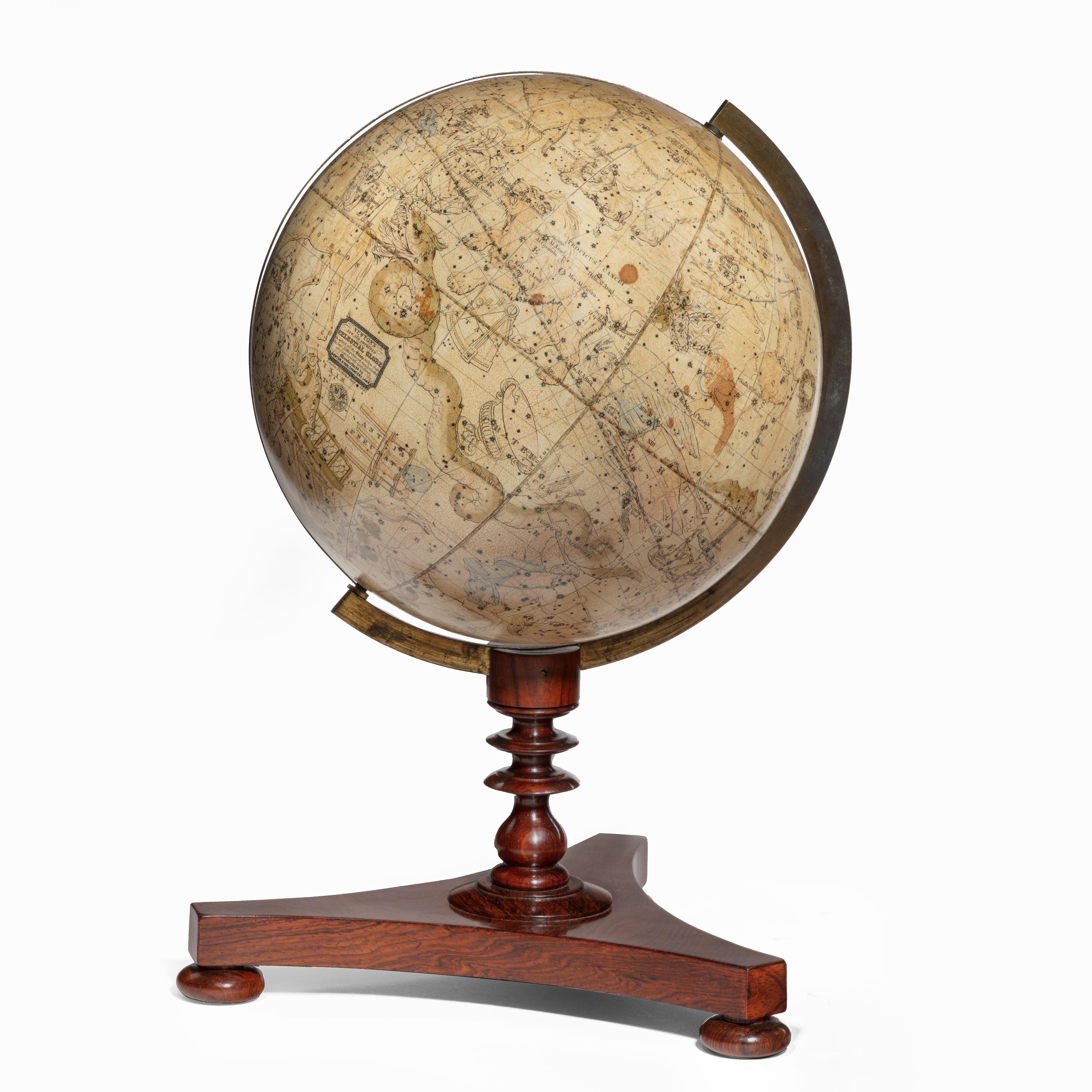 A rare pair of Victorian 8 inch table globes by Newton, each set on a turned rosewood tripod base, the terrestrial with papers updated to 1844, the celestial to 1843. English, circa 1840.
 