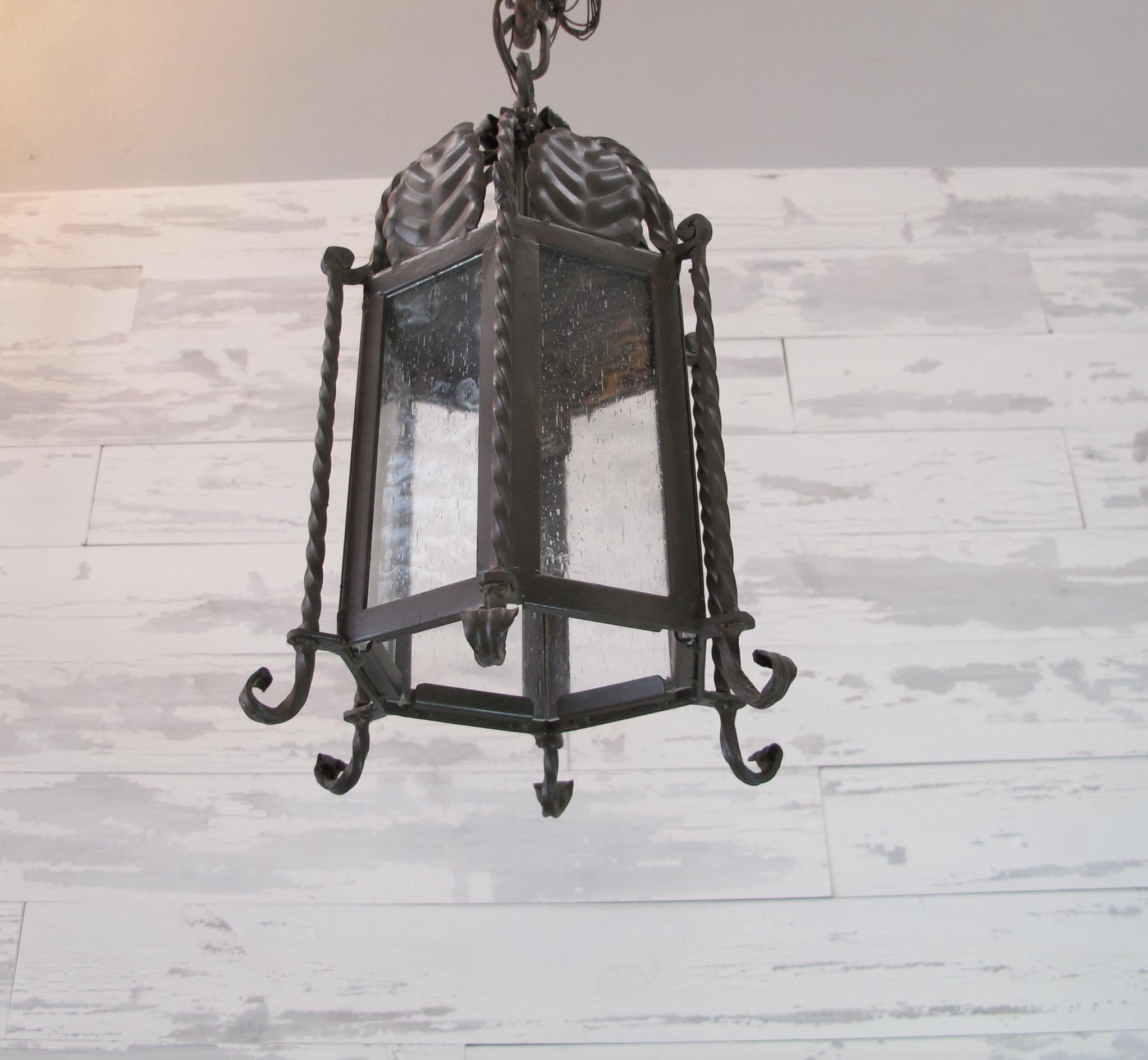 American Pair of Small Forged Iron Lanterns with Seeded Glass For Sale
