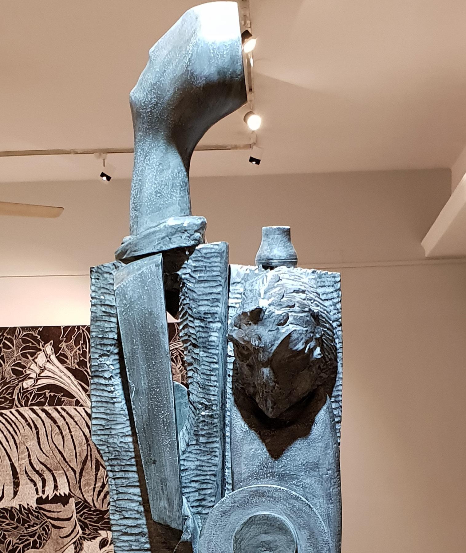 Sunil Kumar Das - Family - 37 x 12 x 6 inches
Wood & Fiberglass. 

Style : In his works, Das strives to simplify, elements and features- as if he wants to distill freely from the figure of animal or human, the essence of a sensibility that is at