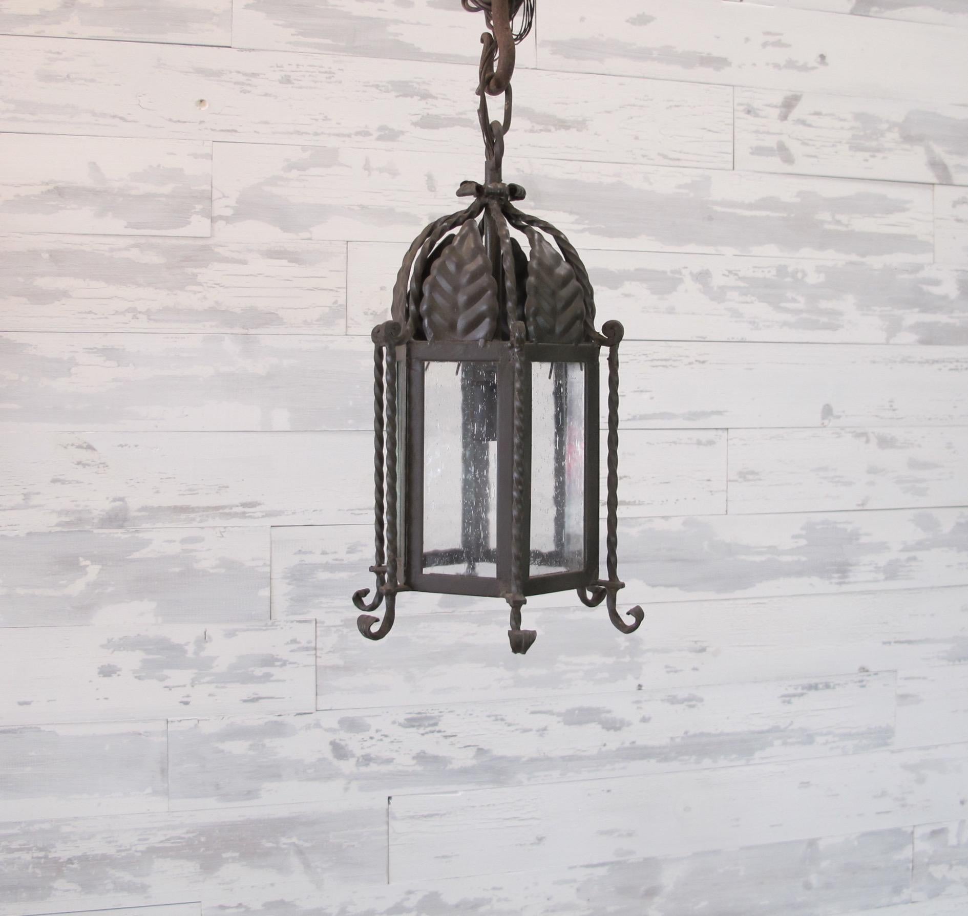 Pair of Small Forged Iron Lanterns with Seeded Glass For Sale 1