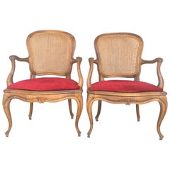 fauteuil Fauteuil Louis XV 18ème à dossier et assise cannés.