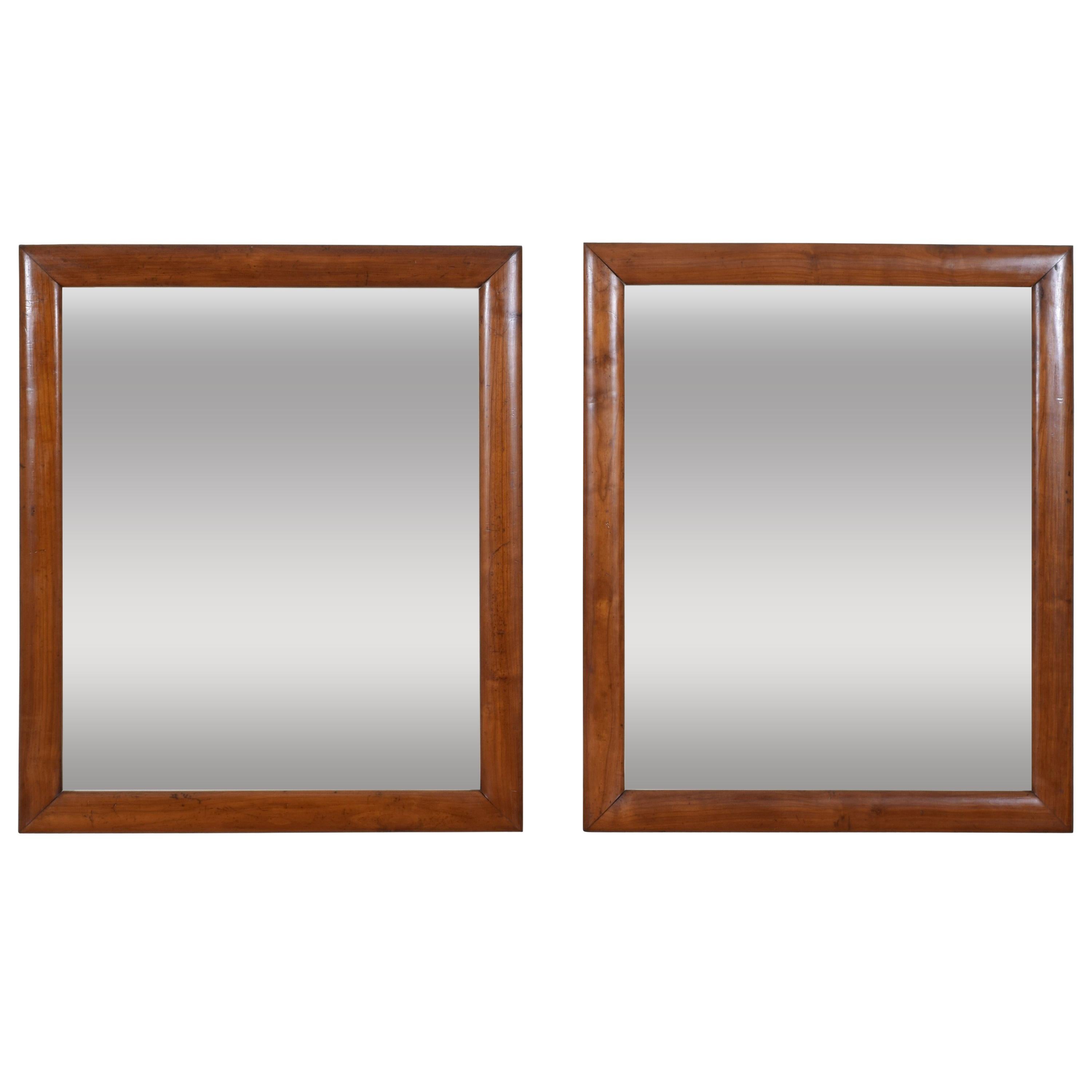 Pair of Italian Neoclassical Period Solid Walnut Mirrors