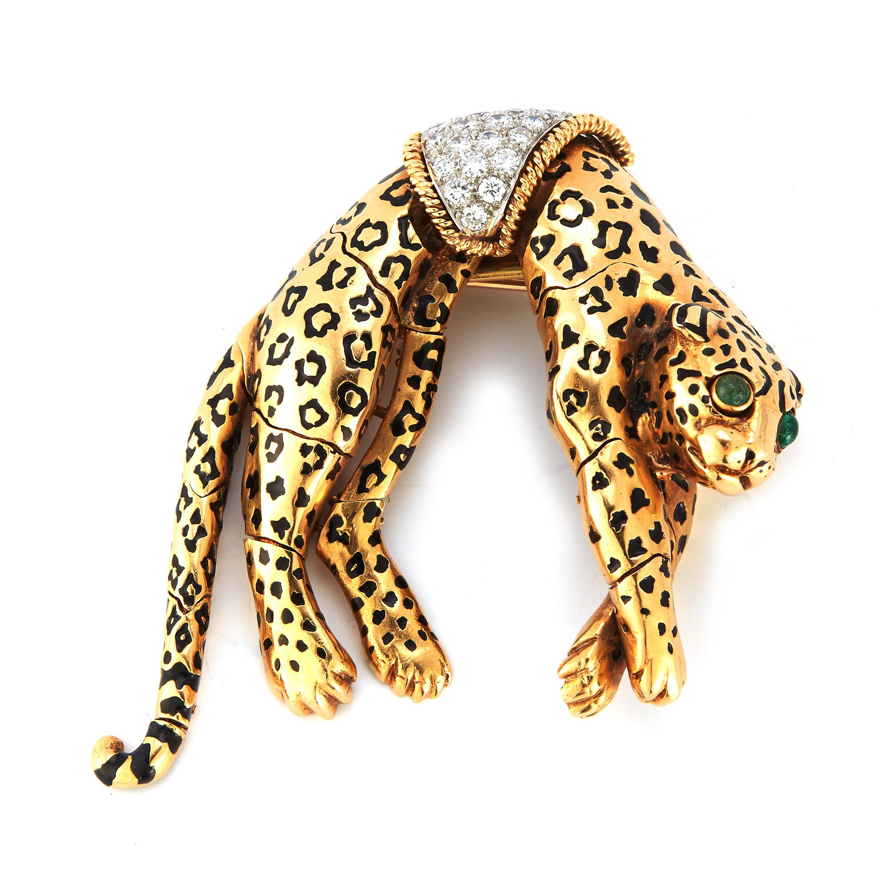 David Webb Panther Brooch

18 karat gold & black enamel with round cut diamonds & 2 emeralds as the eyes

Very well made, it is articulated- the legs move

Measurements: 2.25