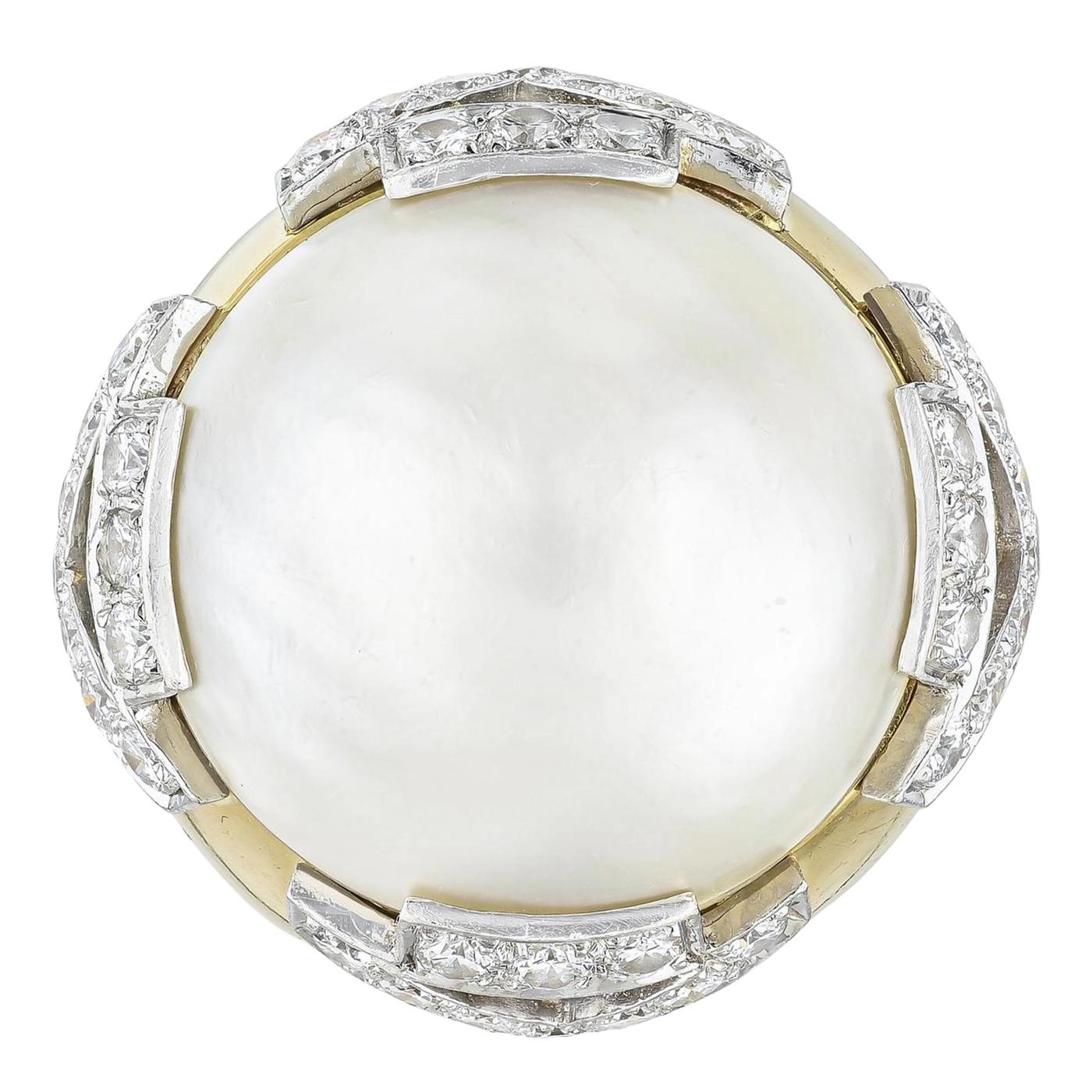 A Very Rare Vintage David Webb 18K Yellow Gold & Platinum Mabe Pearl & 3.10 ct Round Brilliant Cut Diamond Statement / Cocktail Pave Ring. The ring weighs 25.8 grams, size 6, the center stone is a Mabe Pearl, measuring 21.8 x 13.58mm, Cream in