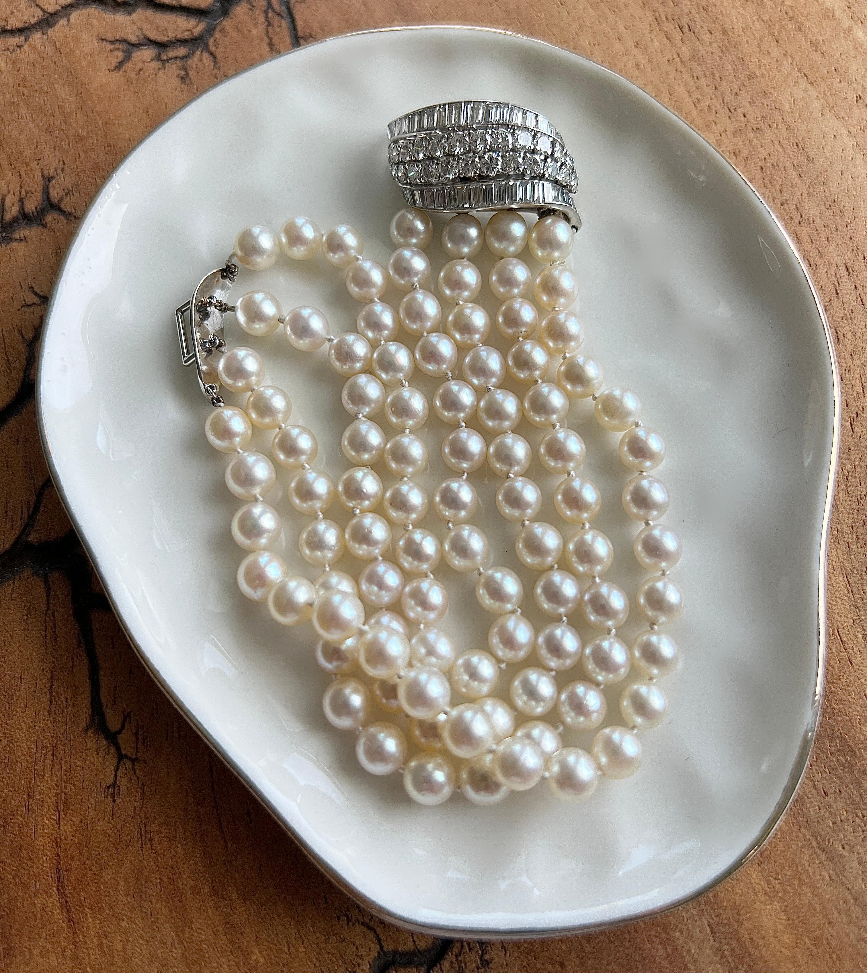 This stunning 1950s platinum bracelet from the David Webb collection showcases a luxurious combination of creamy-toned cultured pearls and exquisite diamonds. Ninety-two pearls, each approximately 6.5mm in diameter, are carefully strung in four