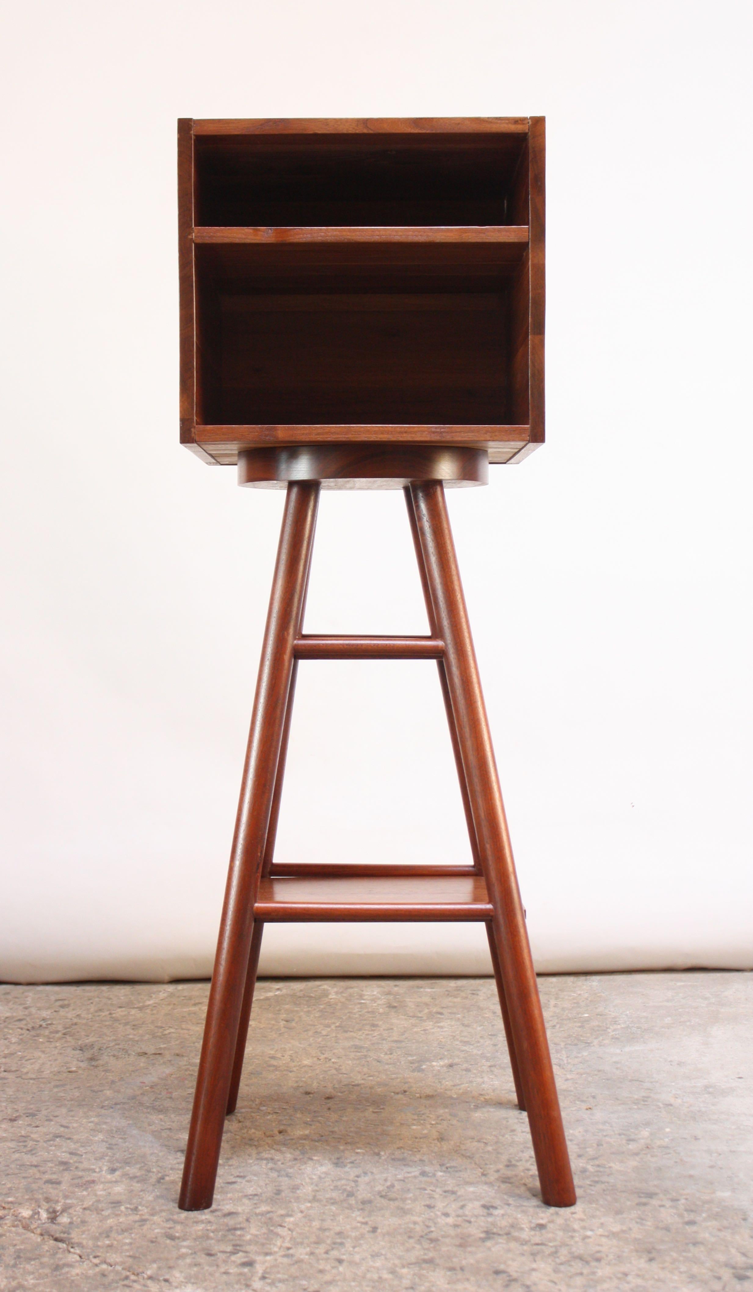 Unique, New Hope style studio craft storage piece in solid walnut by the New York artist, William Perry, who additionally served as a professor of woodworking. Very unusual piece featuring a swiveling storage 'cube' divided into two sections by a