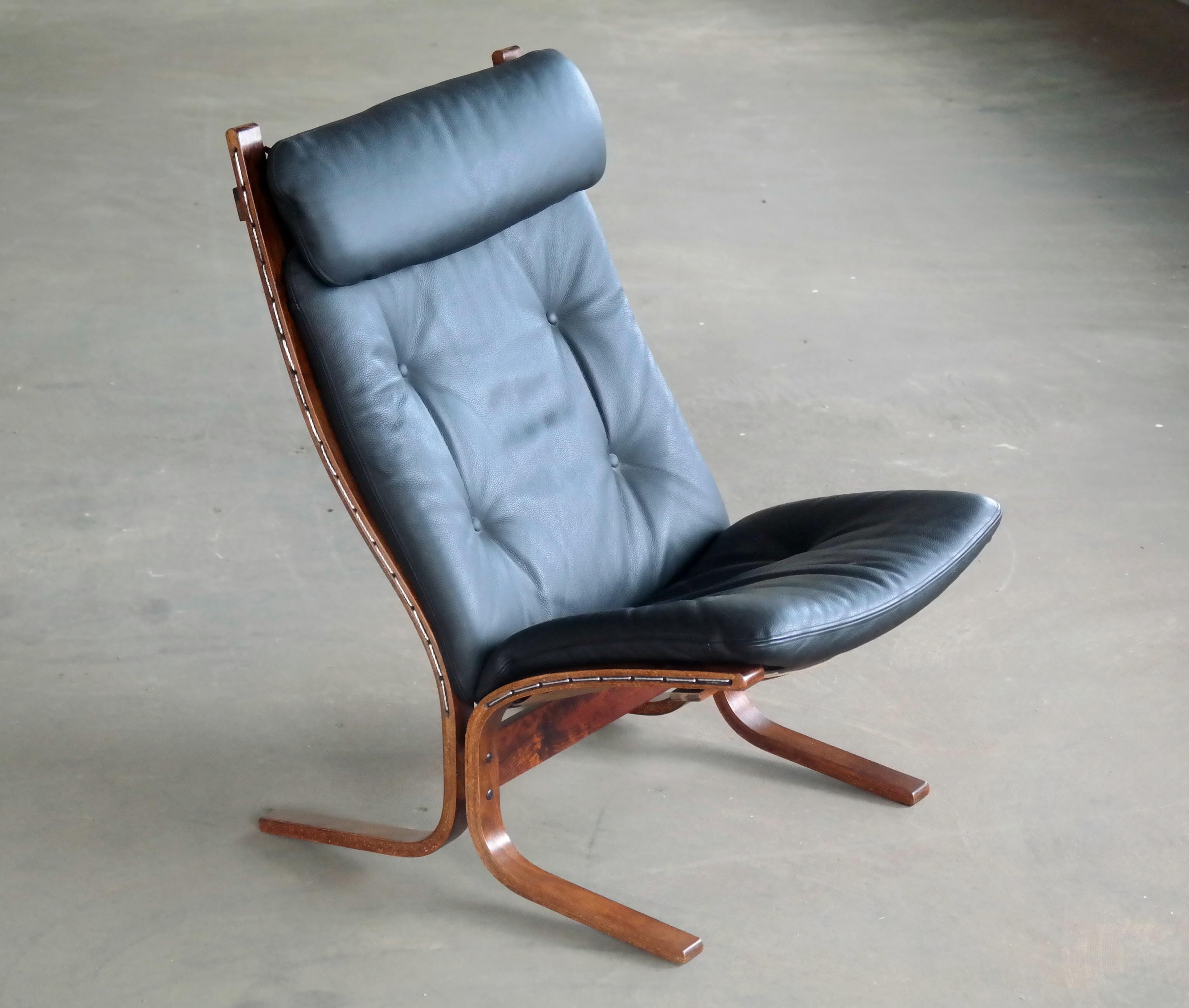 Pair of Leather Easy Chairs Model 