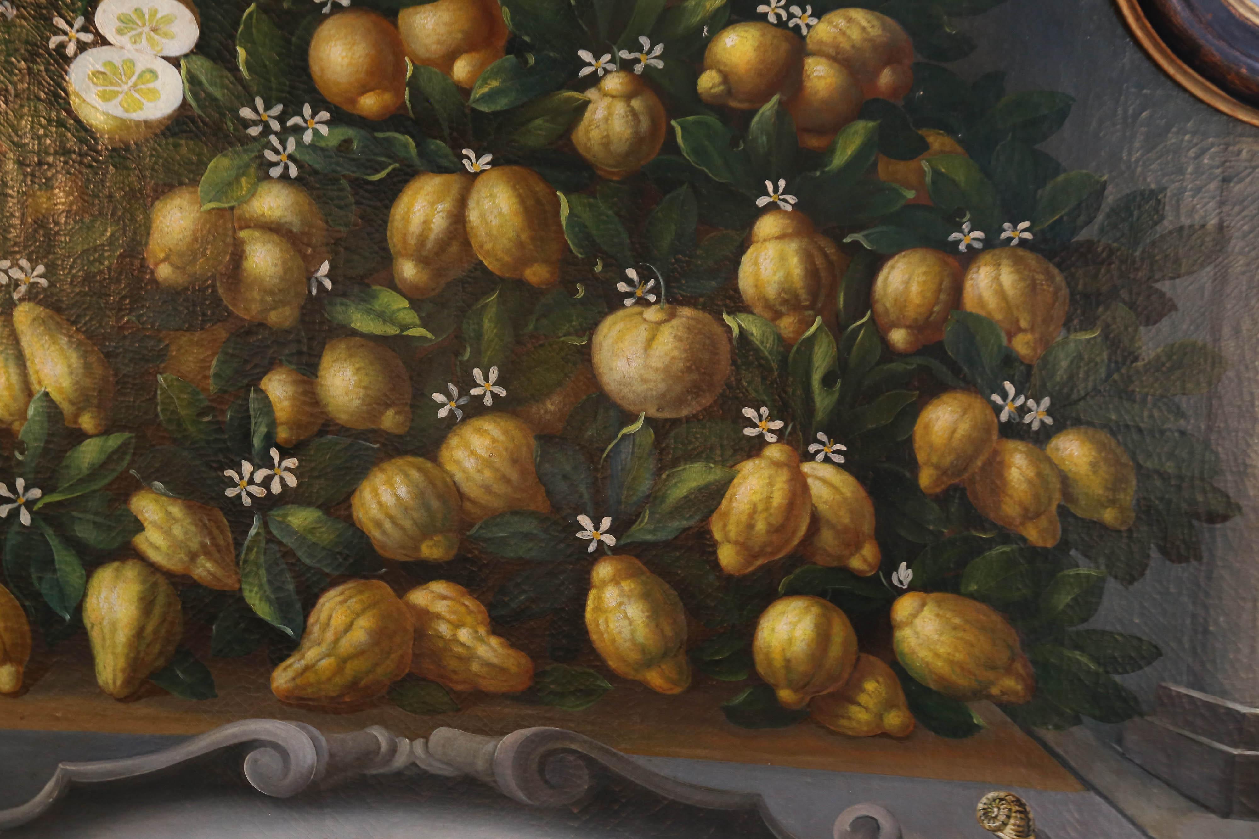Painted panel in the Medici-style of the 17th century
features an over-abundance of ripe lemons and white lemon flowers.
