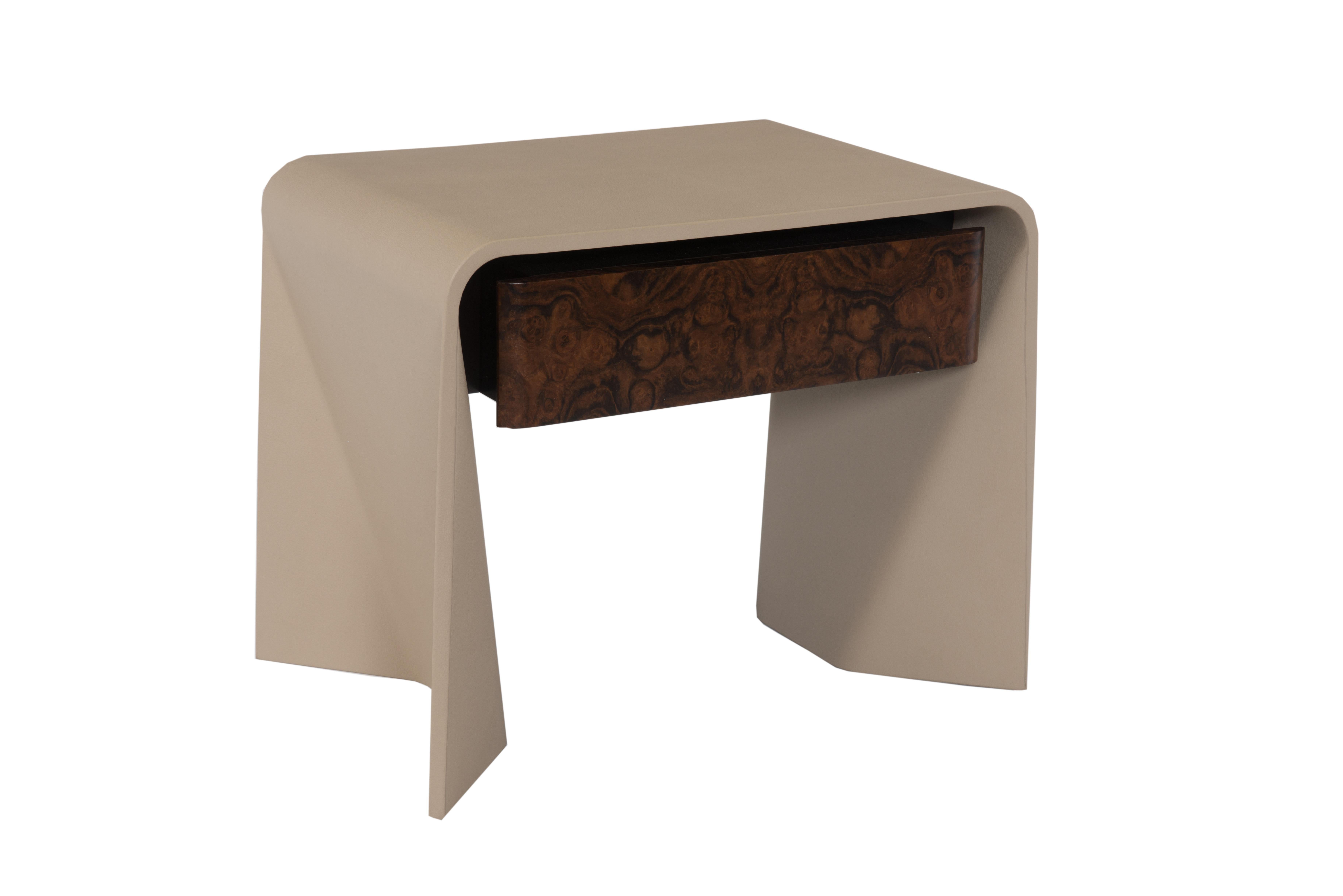 Rectangular bentwood end table featuring one drawer in a burled walnut veneer and a tortora color leather body. Made by bending thin pieces of wood, Tendu is a ballet term meaning 'stretched'. Tendu is offered with a choice of leather or lacquer