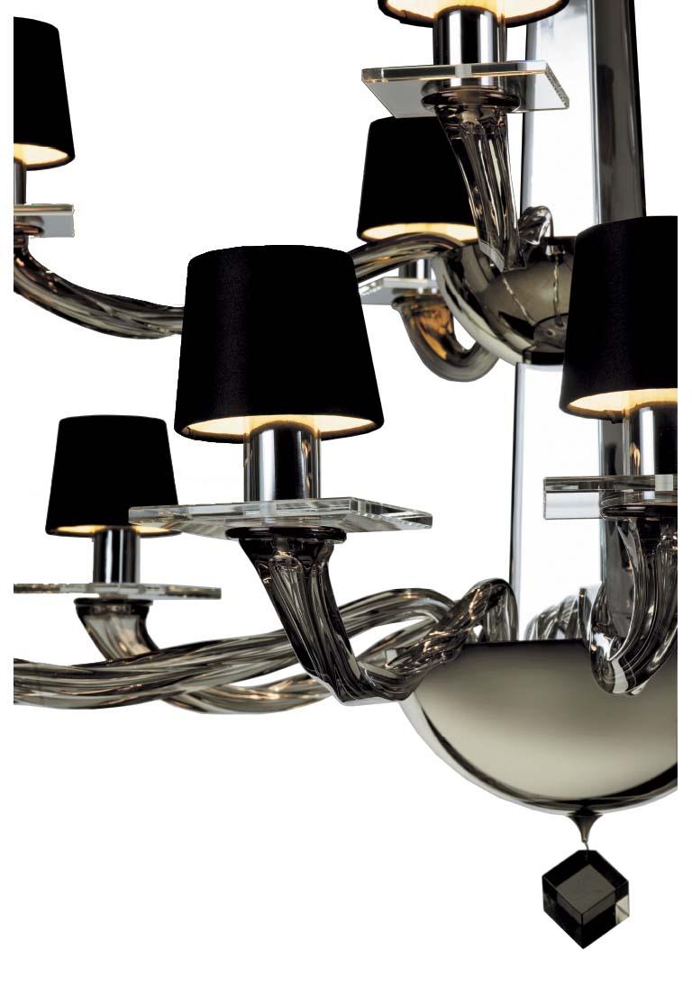 A stunning handblown Venetian glass chandelier with two tiers of arms and infinite charm. Two-tier fifteen-arm chandelier in handblown Murano glass. Grey glass, hand-silvered glass, and brass hardware.

- Canopy dimensions: 5.5