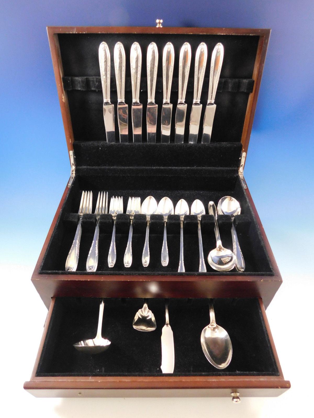 Dinner size Leonore by Manchester sterling silver flatware set - 52 pieces. This set includes:

Eight dinner size knives, 9 5/8