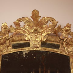 French Early 18th Century Régence Gilt and Carved Wood Mirror