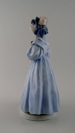 Large Royal Copenhagen Figurine, "Evening walk in Tivoli gardens"