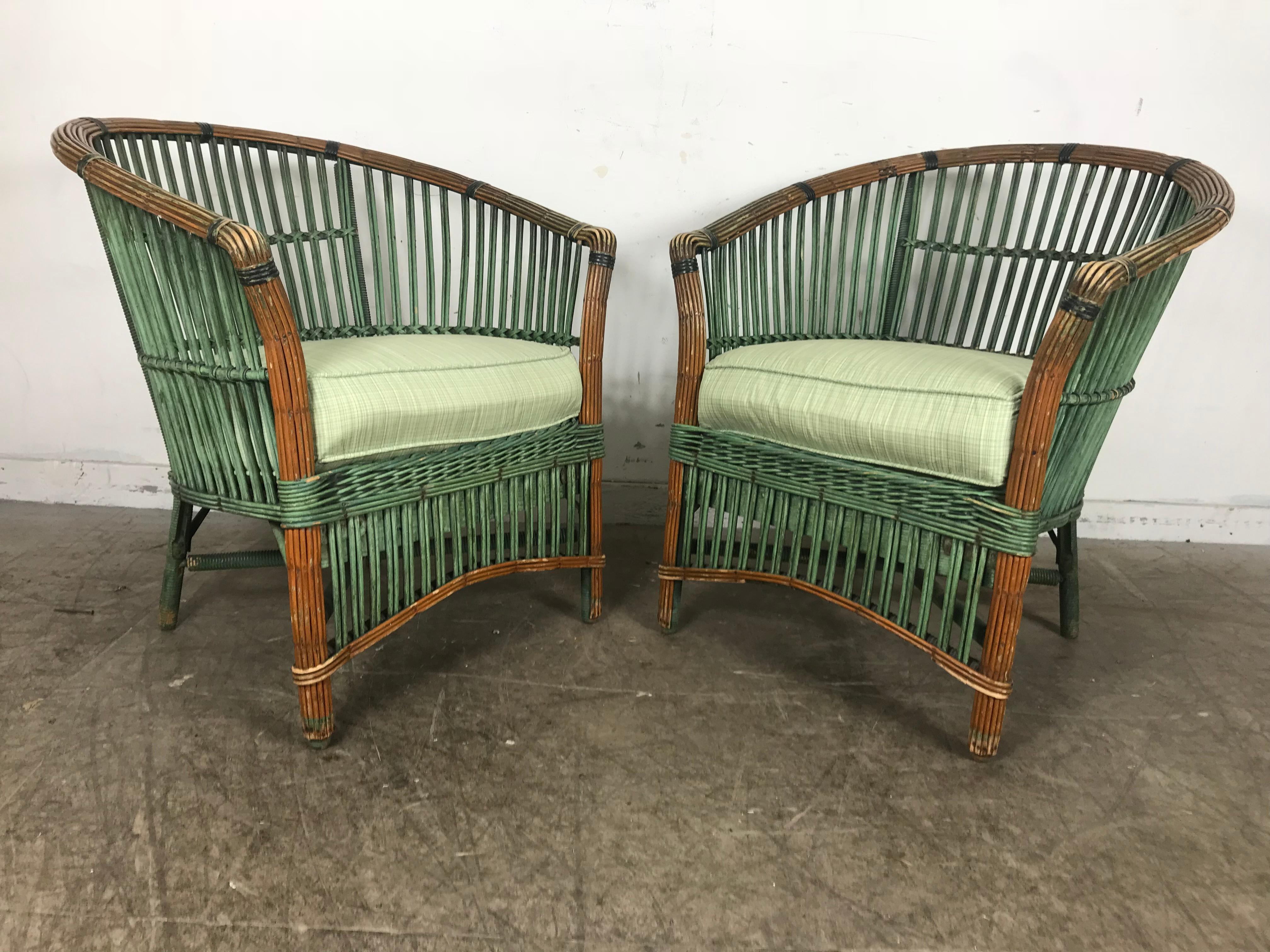 Pair of Art Deco split reed stick wicker lounge chairs, wonderful patina, great color, structurally sound. New down filled seat and back cushions, extremely comfortable, hand delivery avail to New York City or anywhere en route from Buffalo NY.