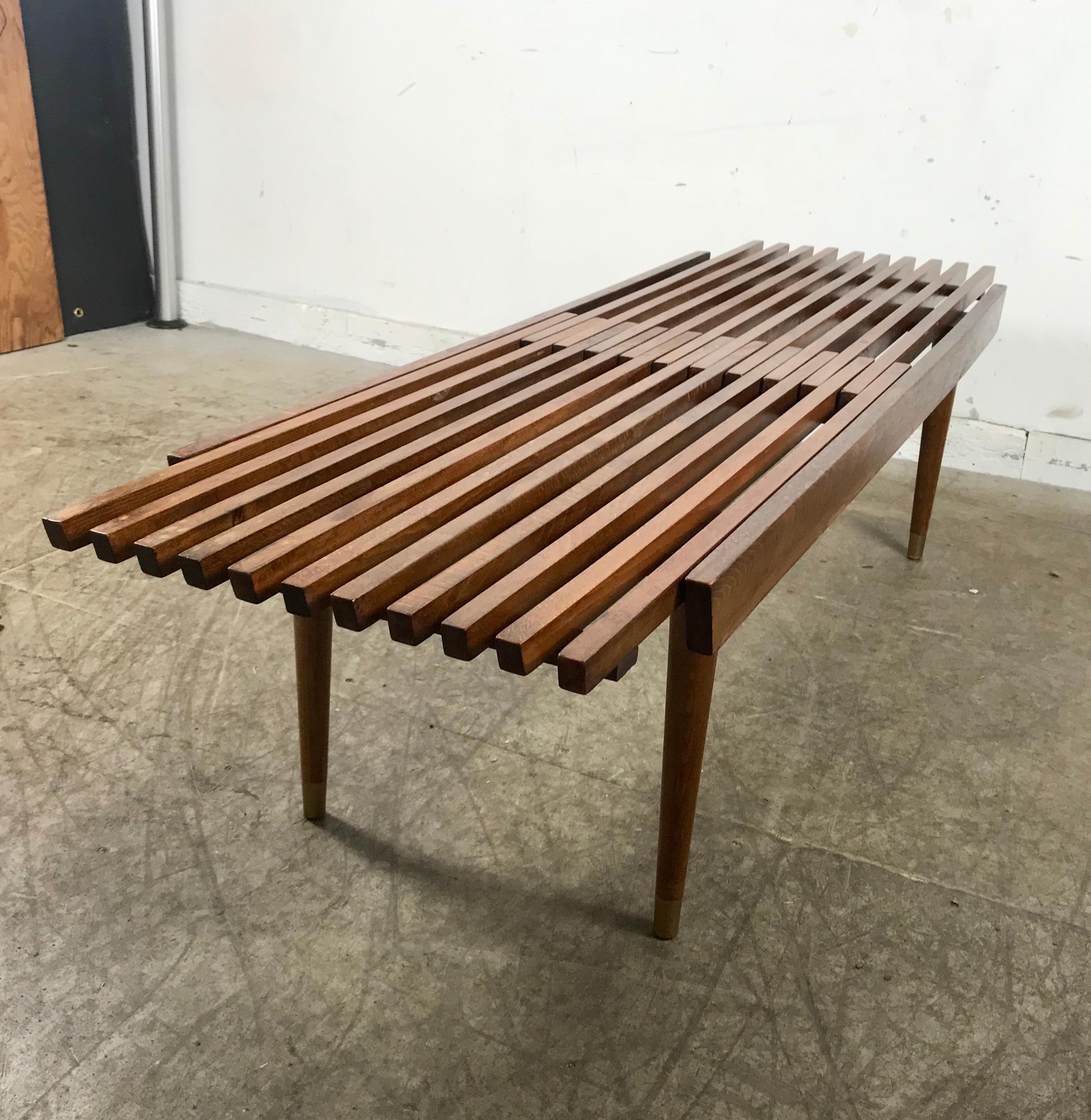 Classic Mid-Century Modern walnut expandable slat bench or table, retains original warm walnut finish and patina, structurally sound, sturdy design, quality construction.