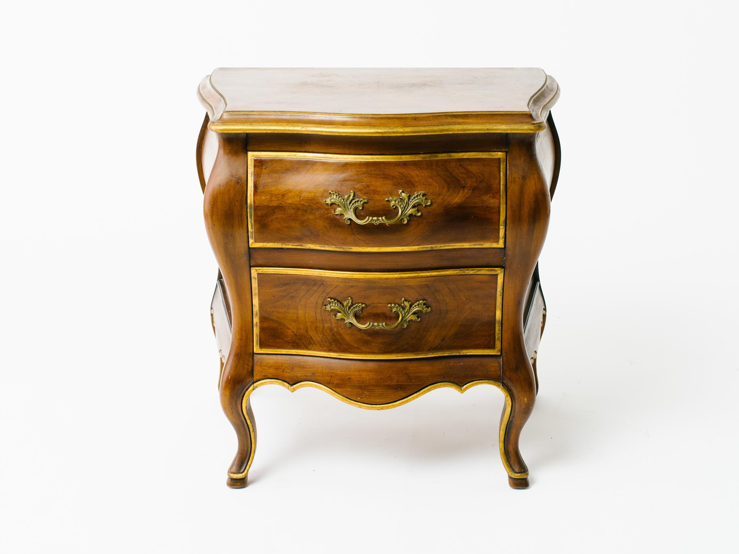 Pair of 1960s Widdicomb Bombay end tables with gold detail.