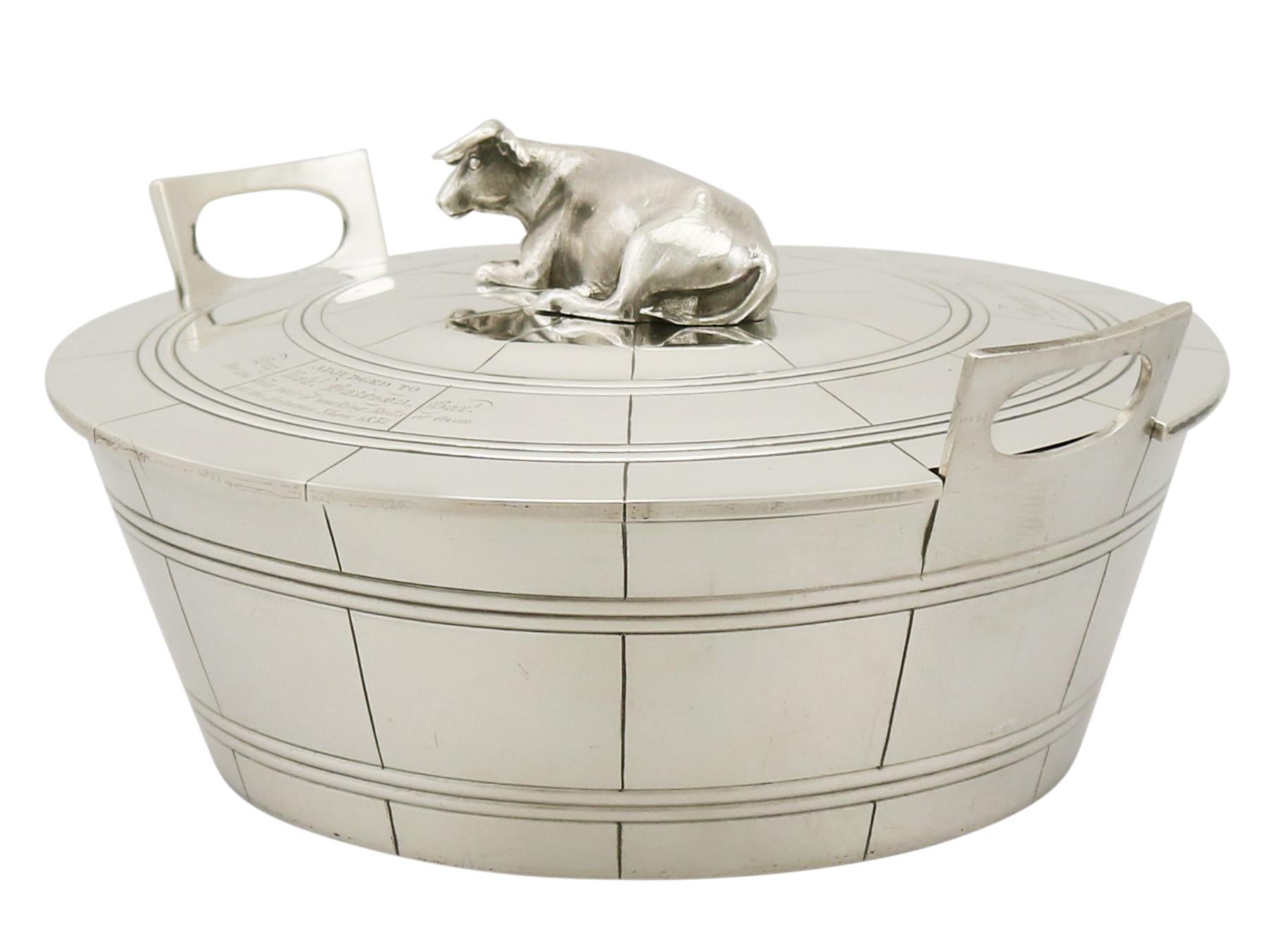 A exceptional, fine and impressive antique William IV English sterling silver butter dish and cover; an addition to our silver dining collection.

This exceptional antique William IV sterling silver butter dish has a circular tapering form