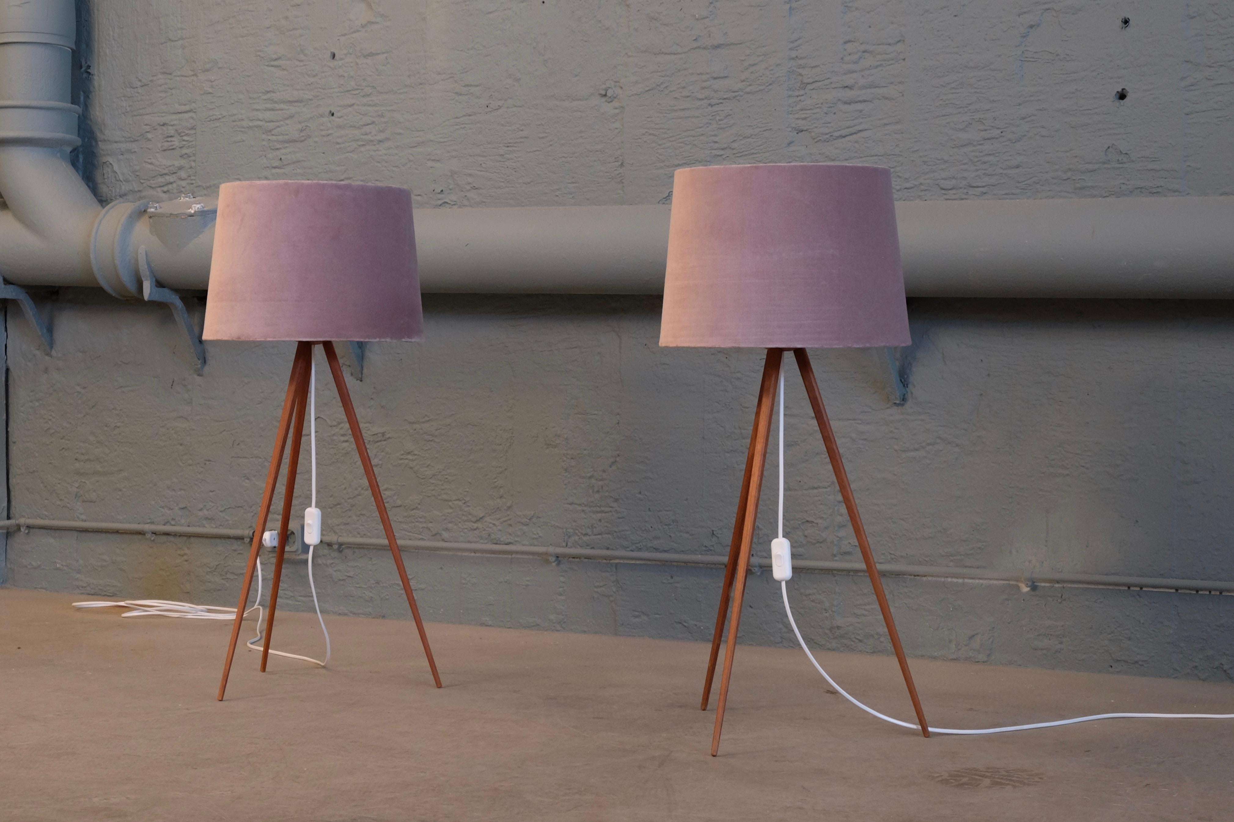 Rare pair of Swedish table or floor lamps, can be used as both, optional.
New wiring. Excellent condition. Pink velvet shades.