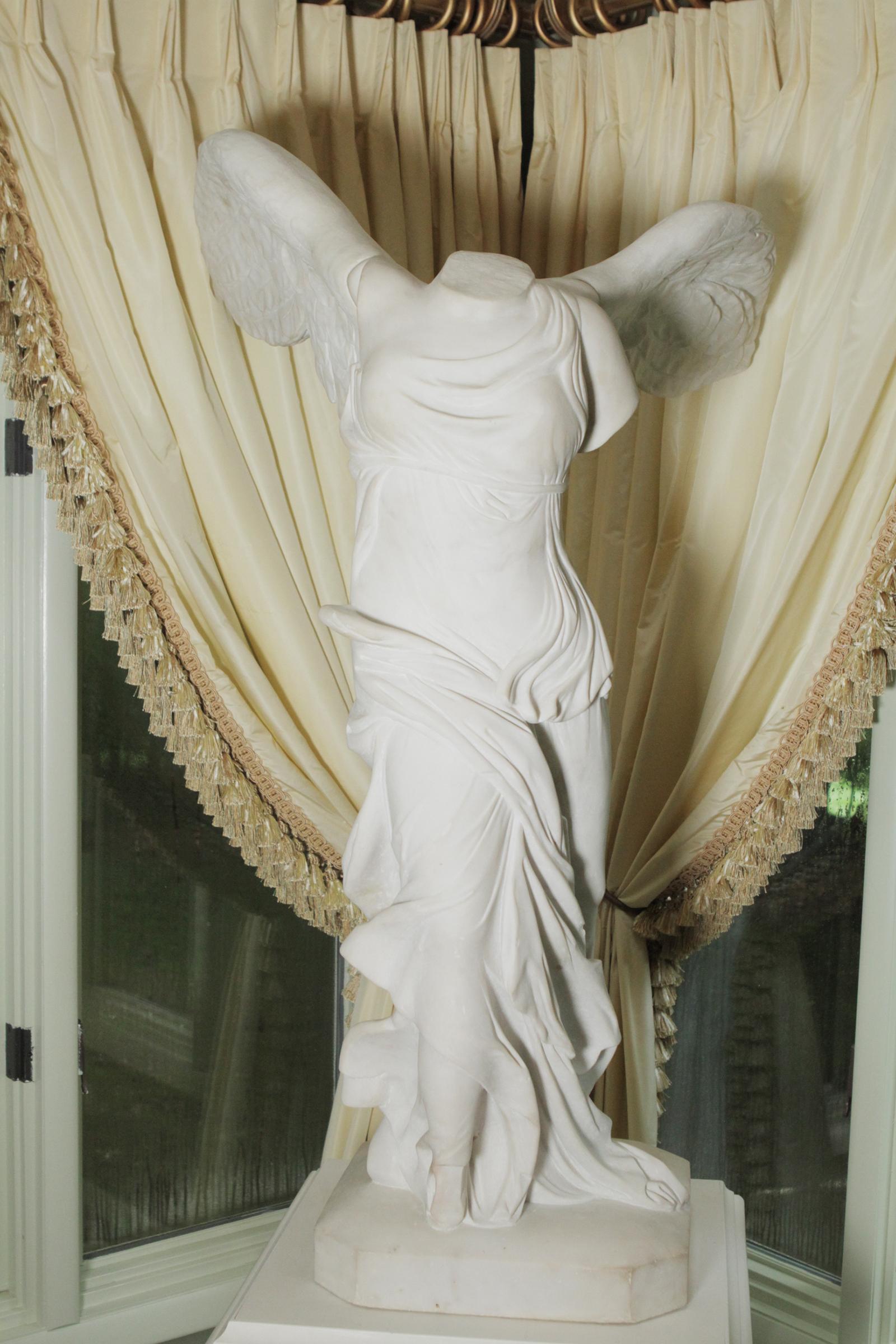 19th century Italian Nike Winged Victory monumental marble figure on custom wood stand

 The Winged Victory of Samothrace, also called the Nike of Samothrace, is a marble Hellenistic sculpture of Nike (the Greek goddess of victory), that was
