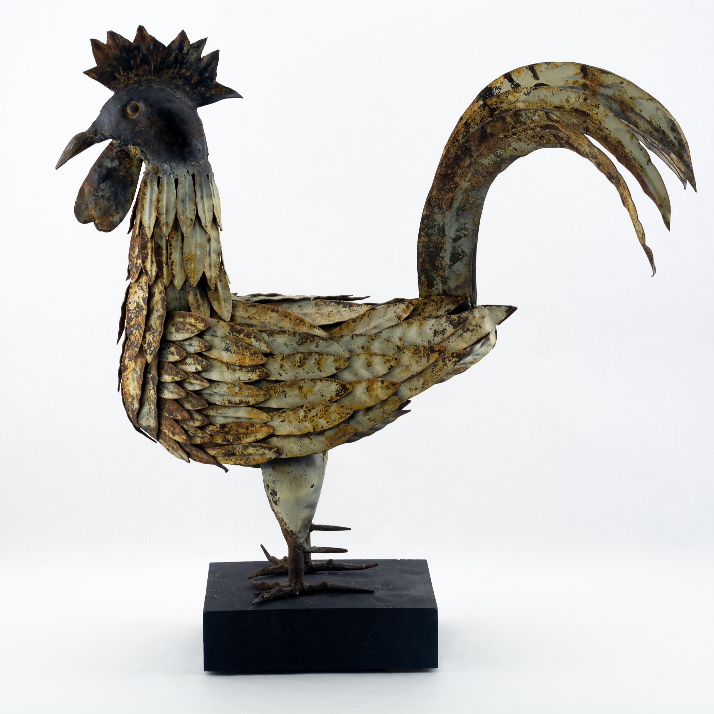 Sculpturing made from cutout sheet metal with layered feathers.
 