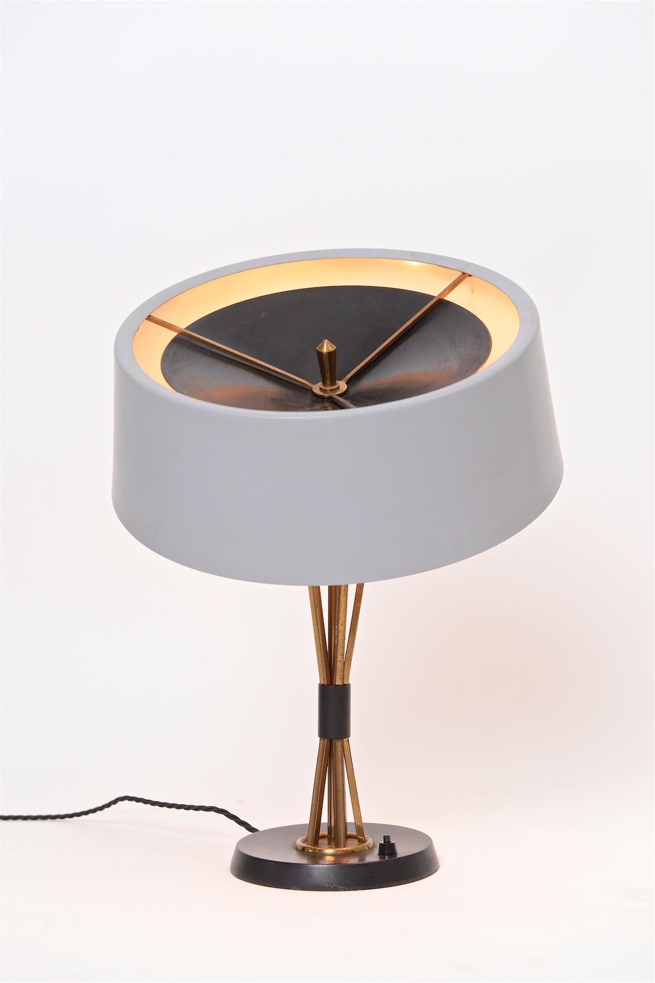 Table lamp by Oscar Torlasco with articulated shade. 
Excellent original condition, original paint work. Re wired.
 