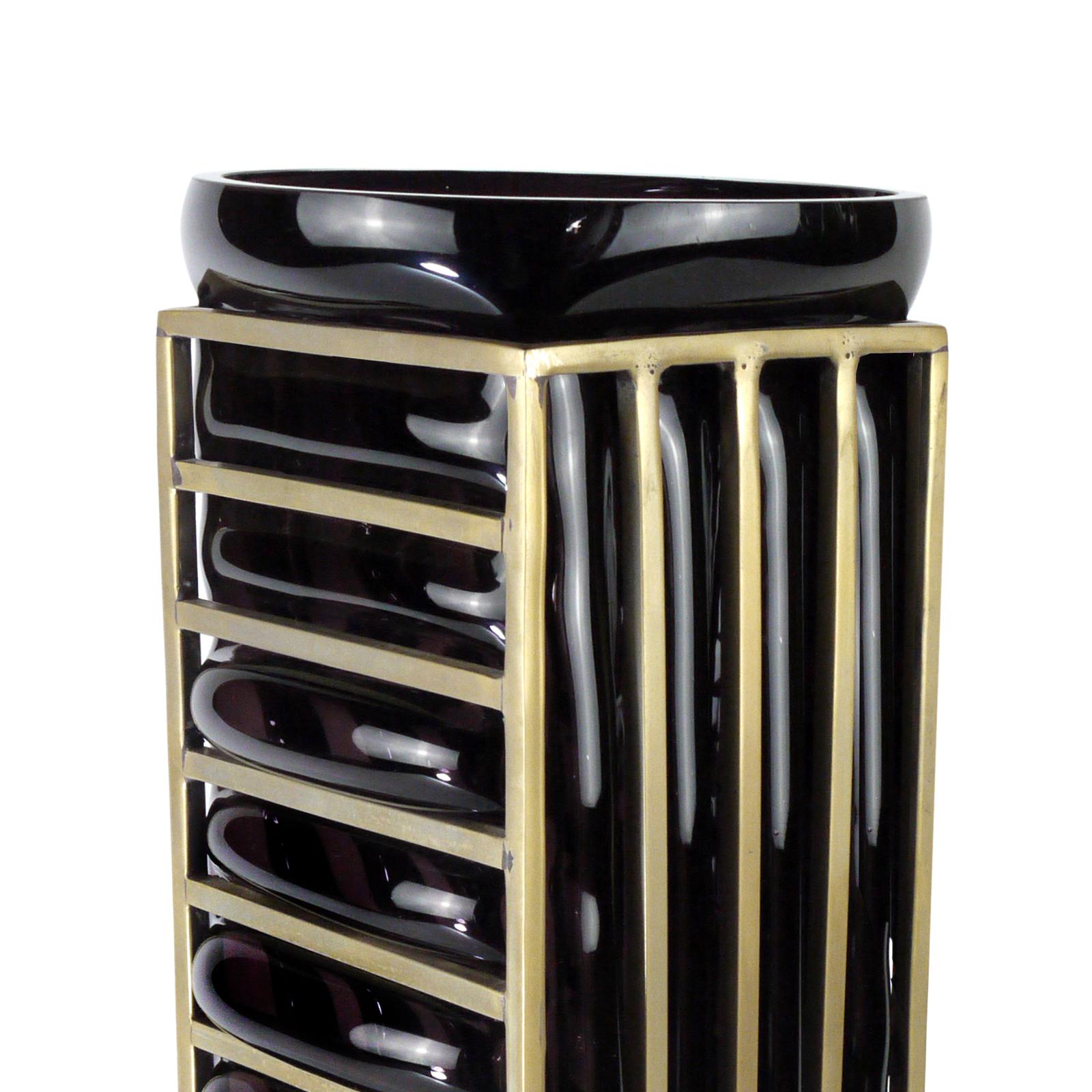 Vase enlace black glass rectangular
with handblown black glass and with
Brass structure around.