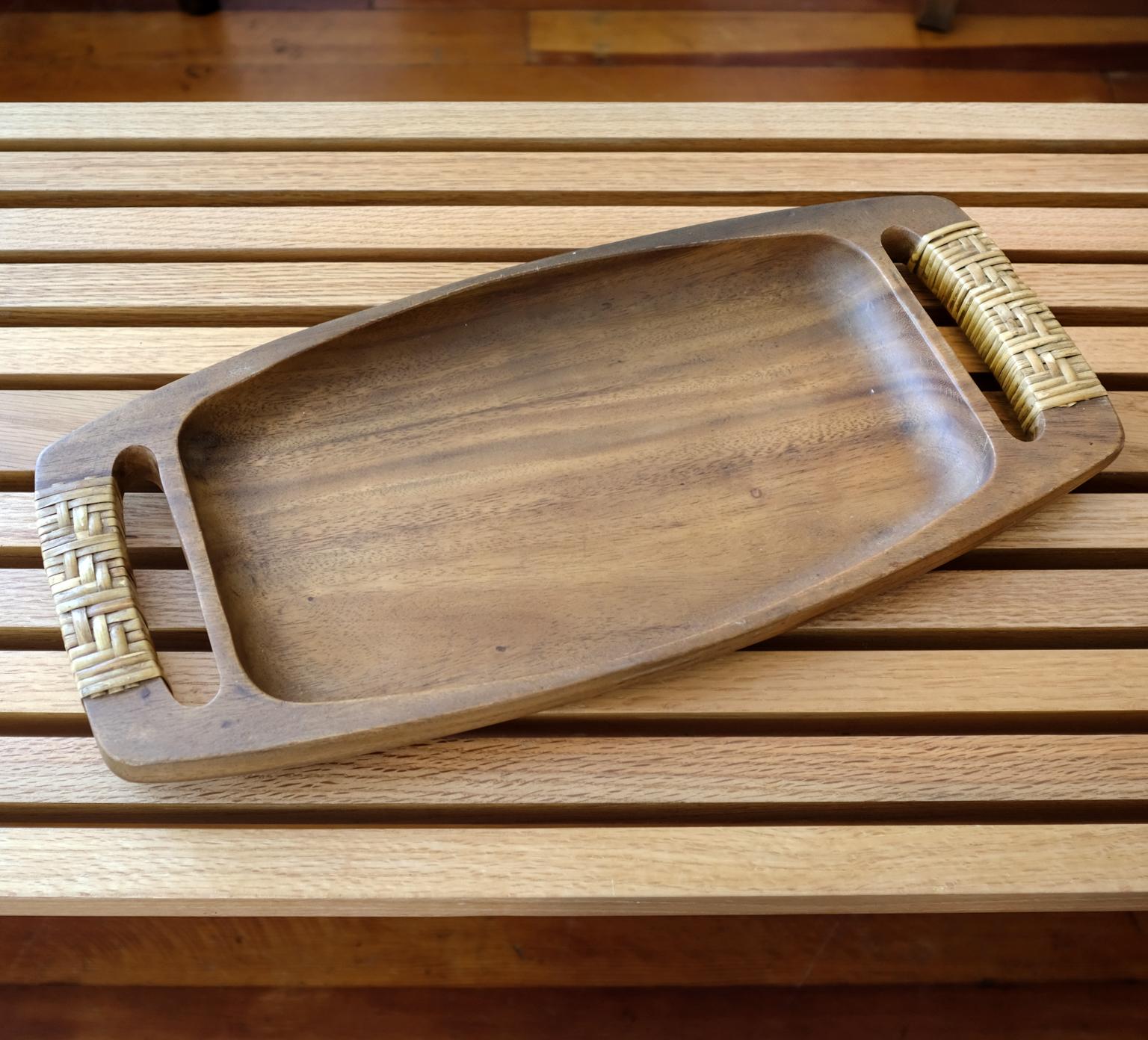 Wood tray or catch all with cane-wrapped handles. Thick carved Philippine mahogany.
