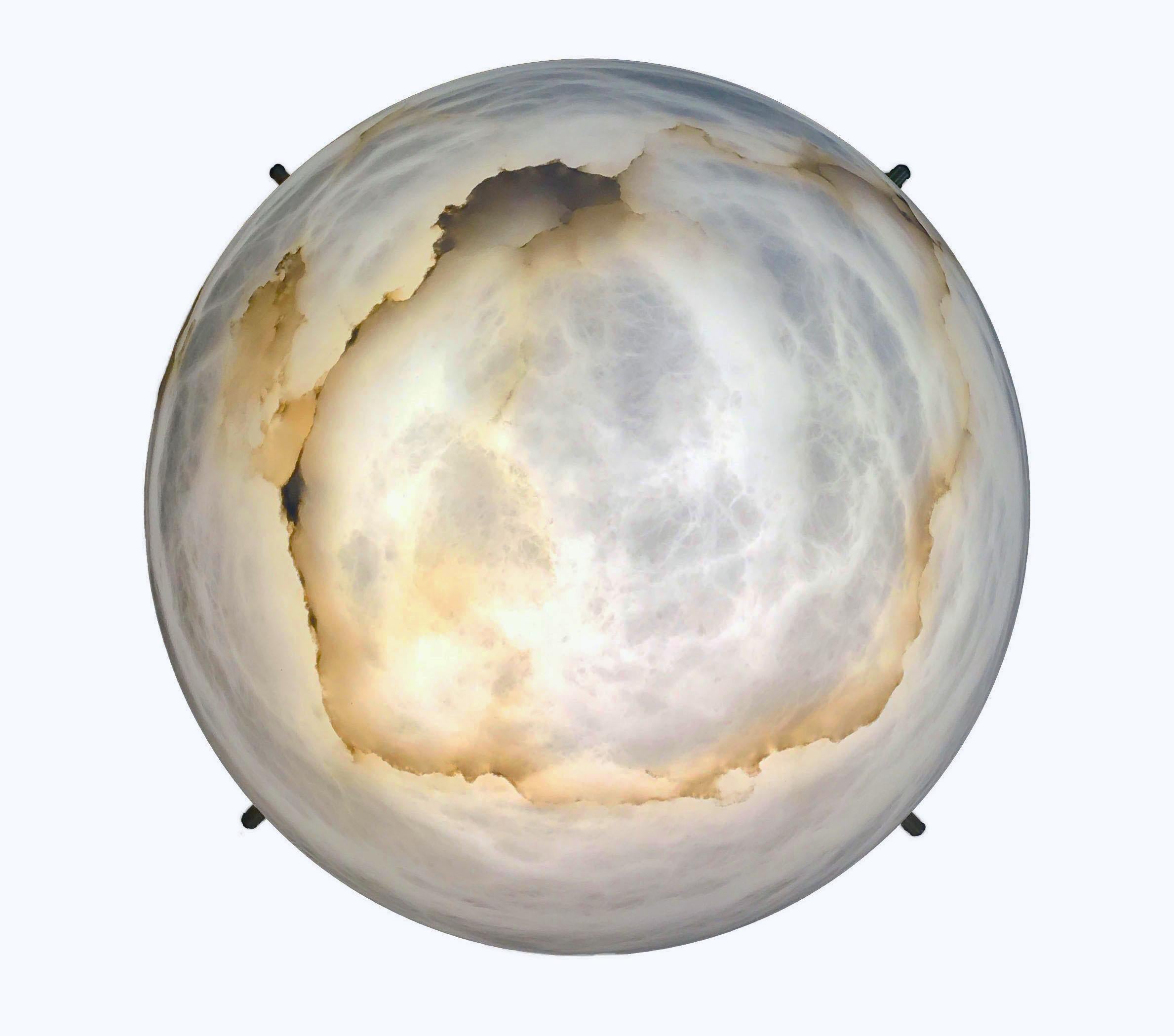 Large 'moon 4' alabaster wall or ceiling lamp in the manner of Pierre Chareau. Handcrafted in Los Angeles in the workshop of noted French designer and antiques dealer Denis de le Mesiere, who meticulously pays homage to the work of Pierre Chareau
