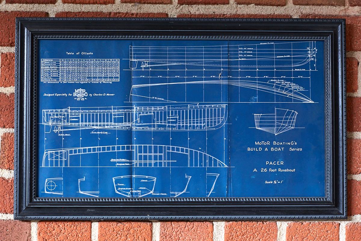 Associated pair of framed nautical blueprints of vintage boats. Features a draft boat and a roundabout. Each framed with similar black frames with no glass. Great vintage patina and look. Frames vary in size and style.
