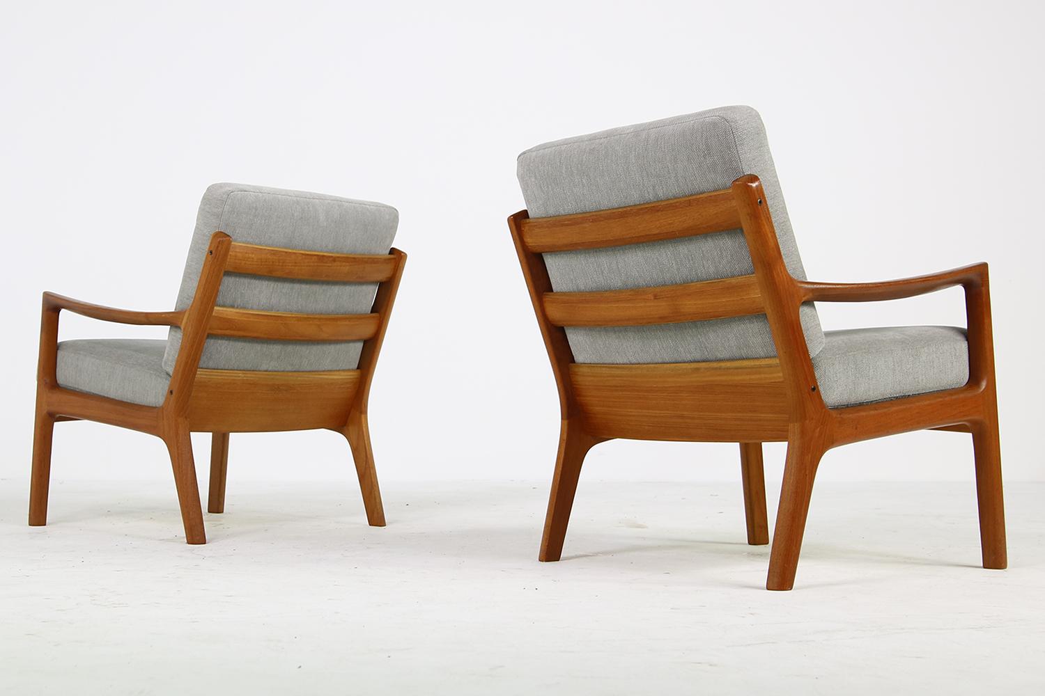 Beautiful pair of 1960s Danish modern Ole Wanscher easy chairs, senator series in Teak. New upholstery in high quality woven fabric, in grey. Overall a fantastic condition. Made by France & Son, Denmark.