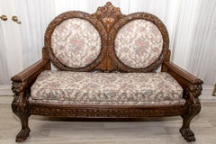 Late 19th Century Ornately Carved Oak Settee