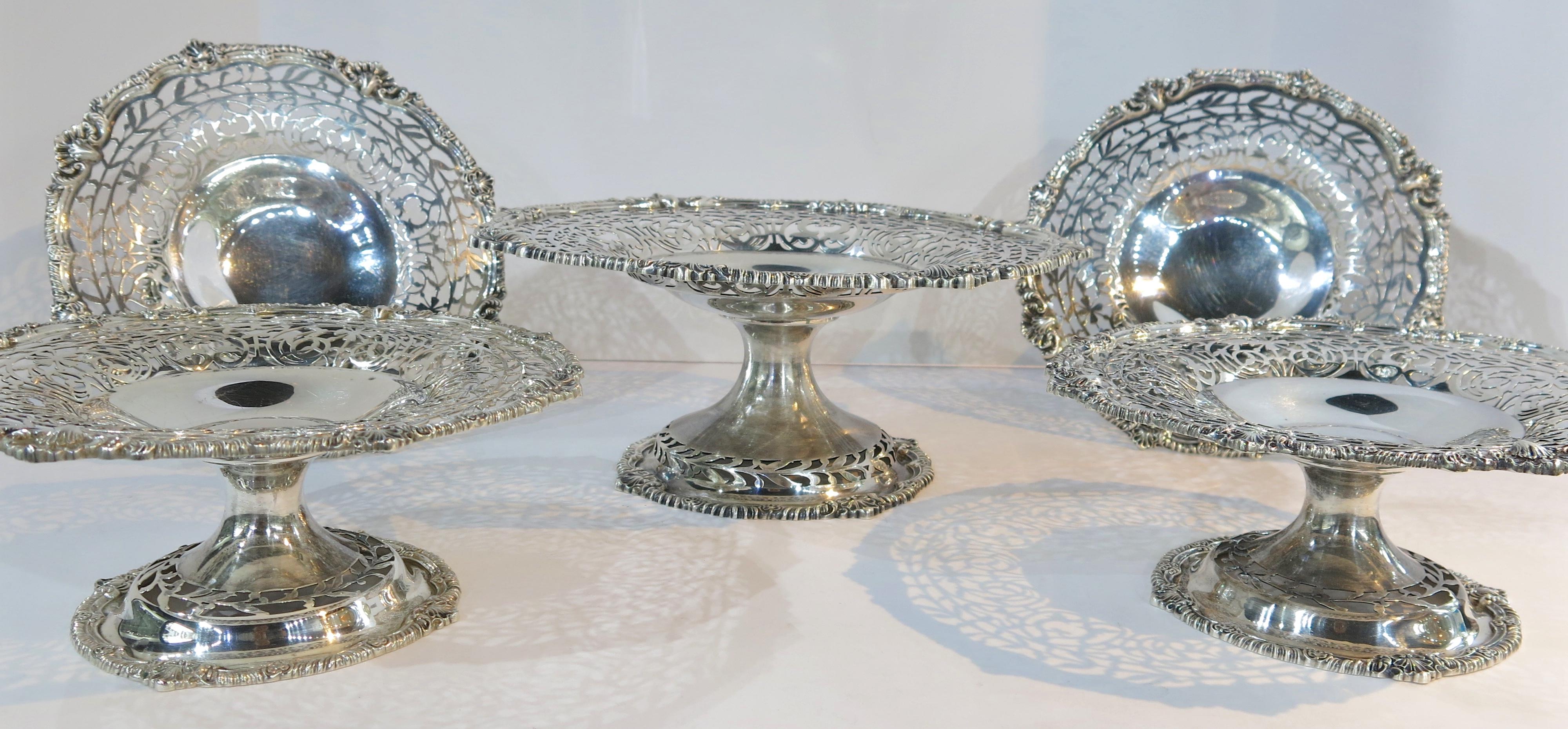Antique suite of five sterling silver Taza, consisting of one large dish and four smaller to match. All are with a cast shell & gadroon border on the rim of the dish and on the rim of the pedestal foot. The main part of the dish is beautifully