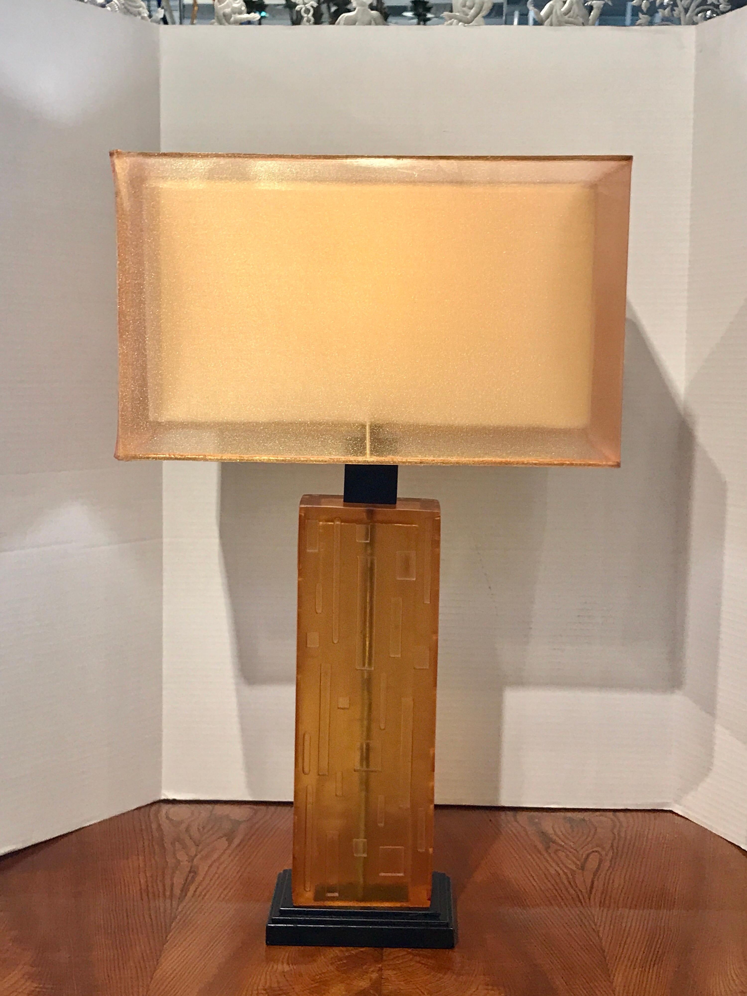 Pair of cityscape citrine Lucite lamps with custom shades, standing 28.5