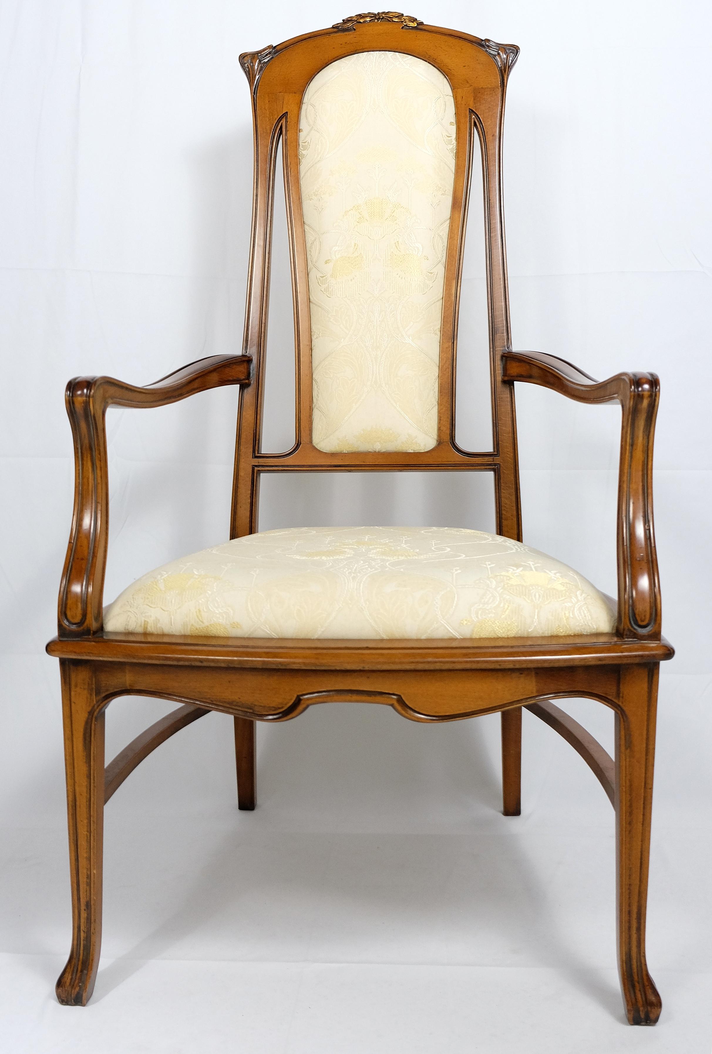 Medea Hand-Carved Art Nouveau Style Armchairs, Pair

Offered for sale is a pair of hand-carved high-back armchairs created in the Art Nouveau style from Medea. The chairs are gracefully formed and are upholstered in a gold accented Art Nouveau motif