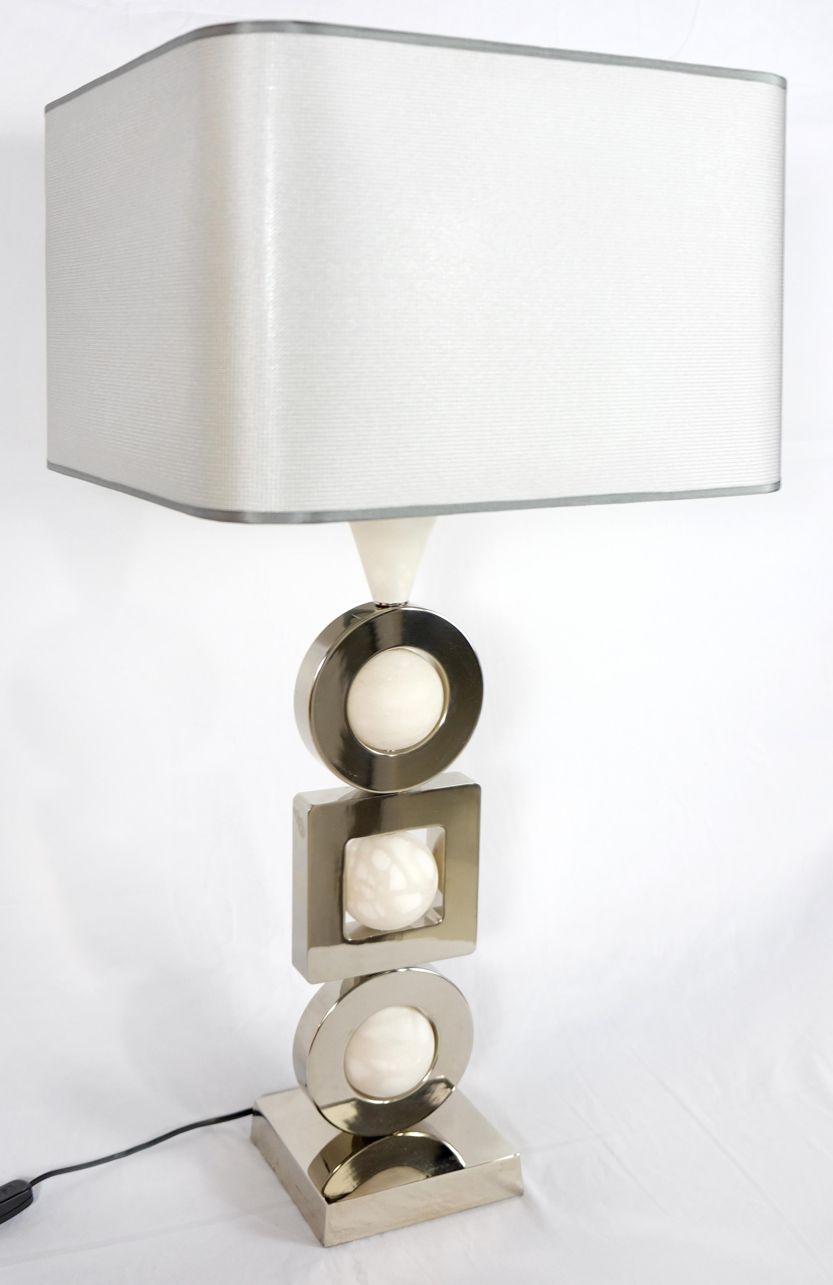 Laudarte Srl Andromeda Table Lamp by Attilio Amato, pair available

Offered for sale is a fine quality brass and marble 