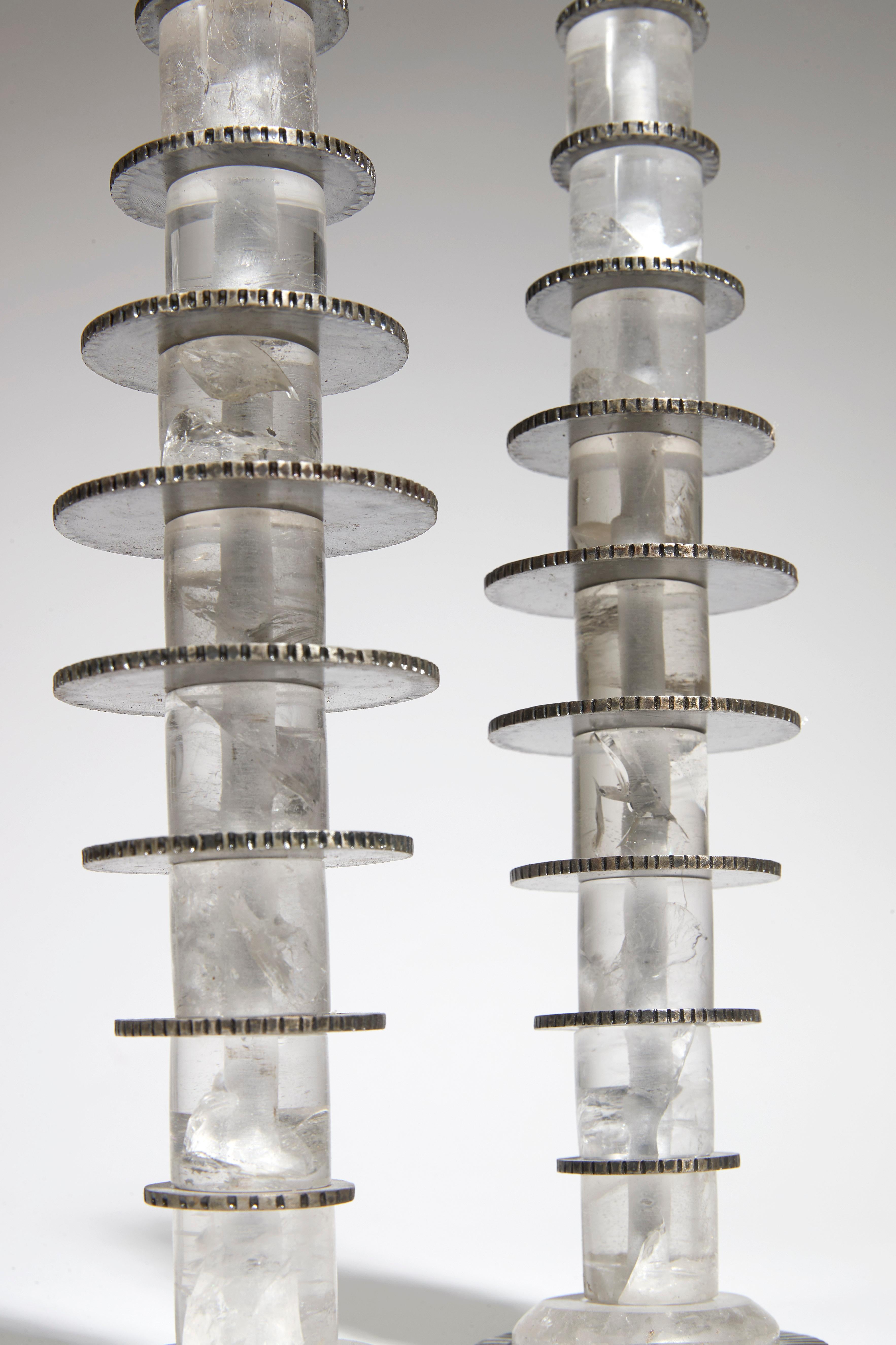 Nine elements in rock crystal, spacers and base in hammered wrought iron.